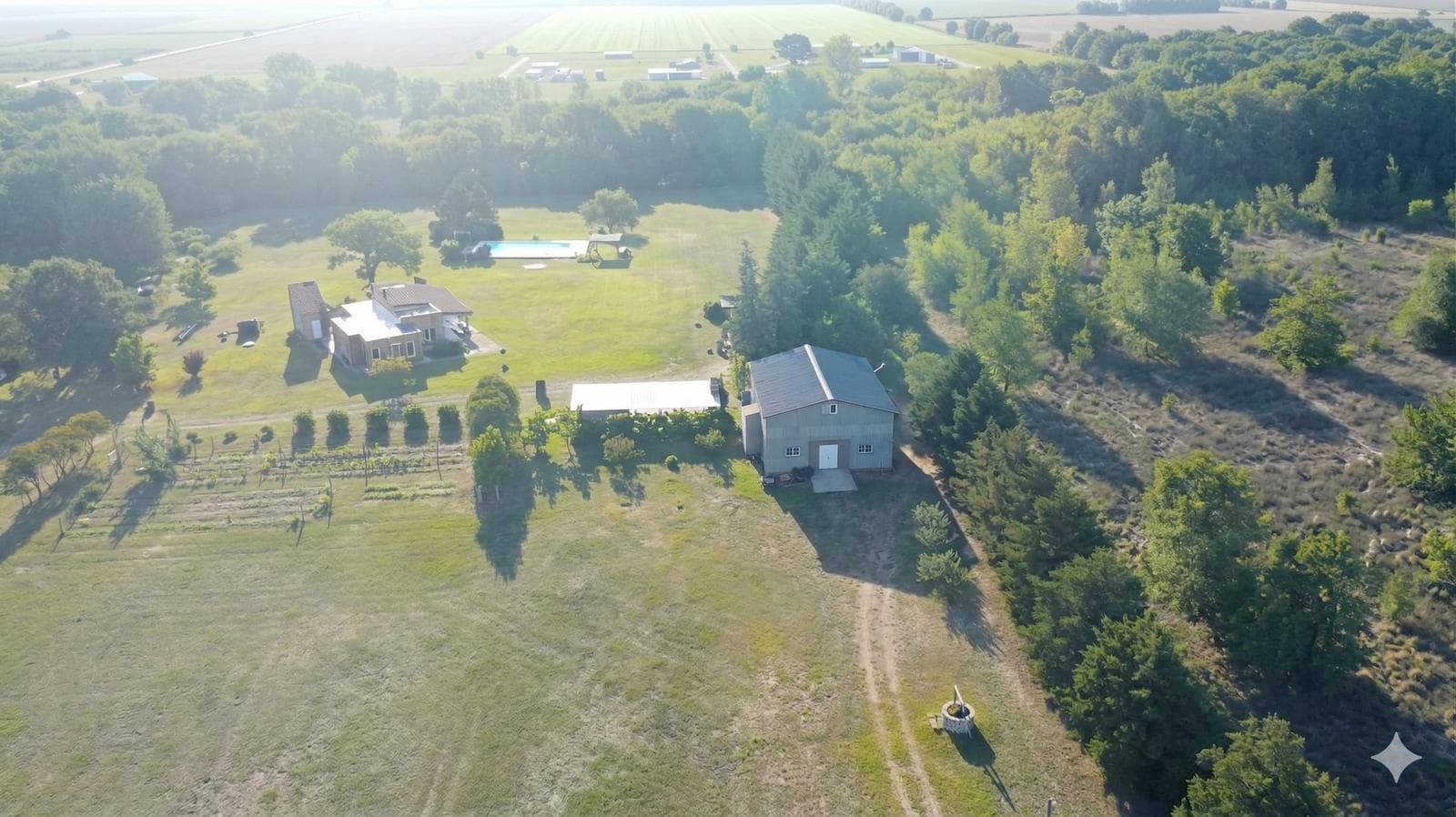 House in Anisacate | 4.5 Ha of Natural Beauty: Fruit Grove, Private Stream, and Large Pool