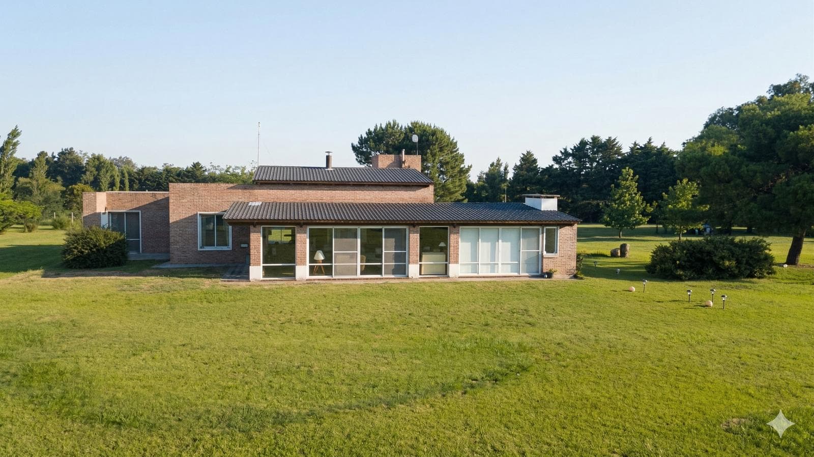 House in Anisacate | 4.5 Ha of Natural Beauty: Fruit Grove, Private Stream, and Large Pool