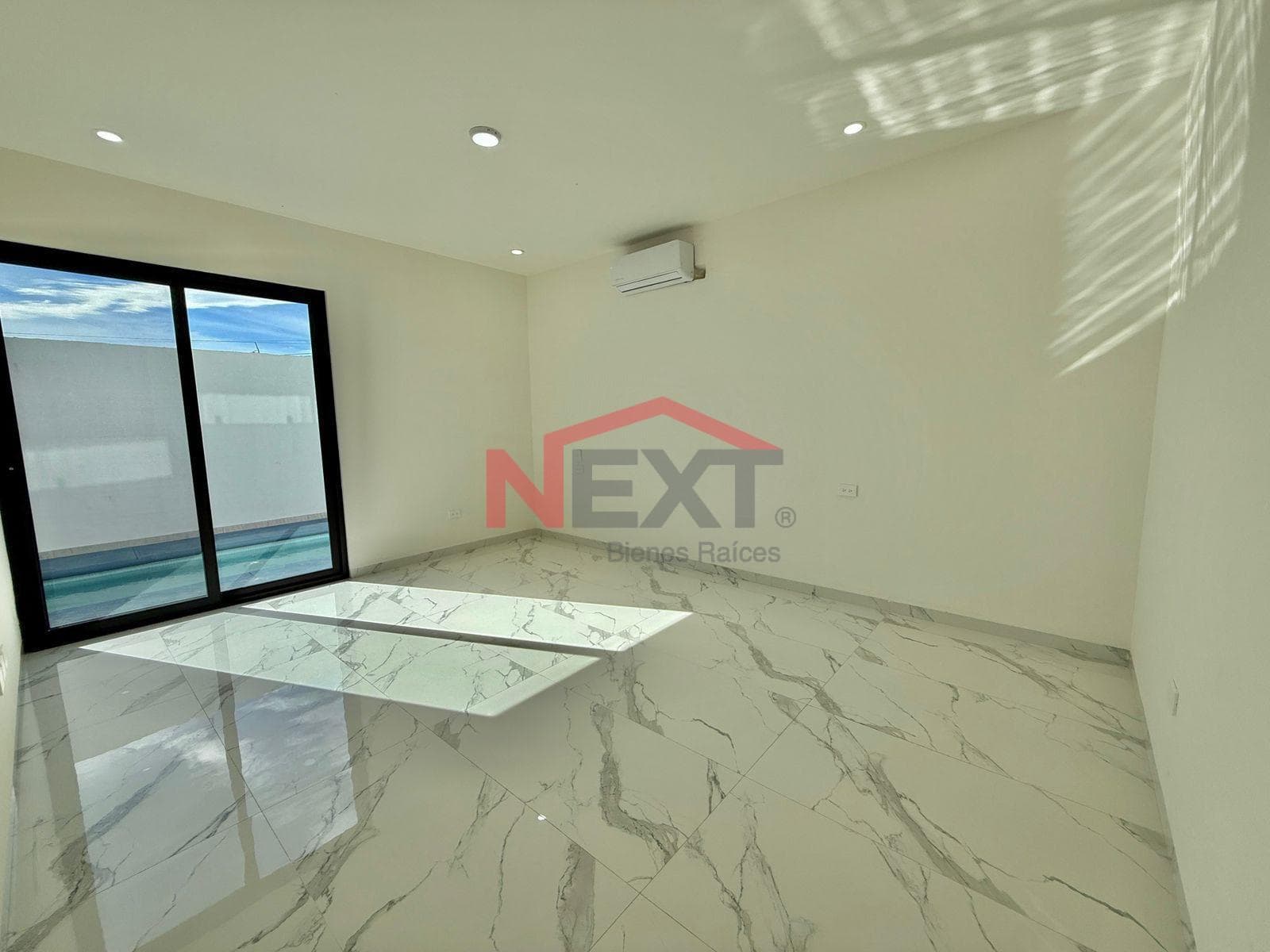 New House Near the Beach with a Pool, Panoramic Terraces, and High-Quality Finishes.