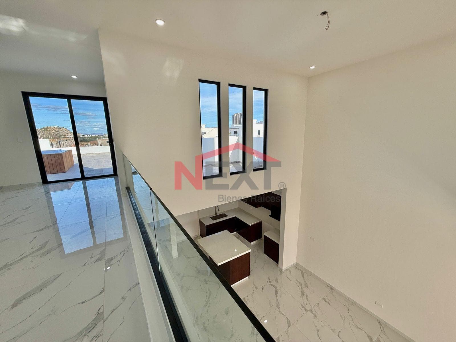 New House Near the Beach with a Pool, Panoramic Terraces, and High-Quality Finishes.