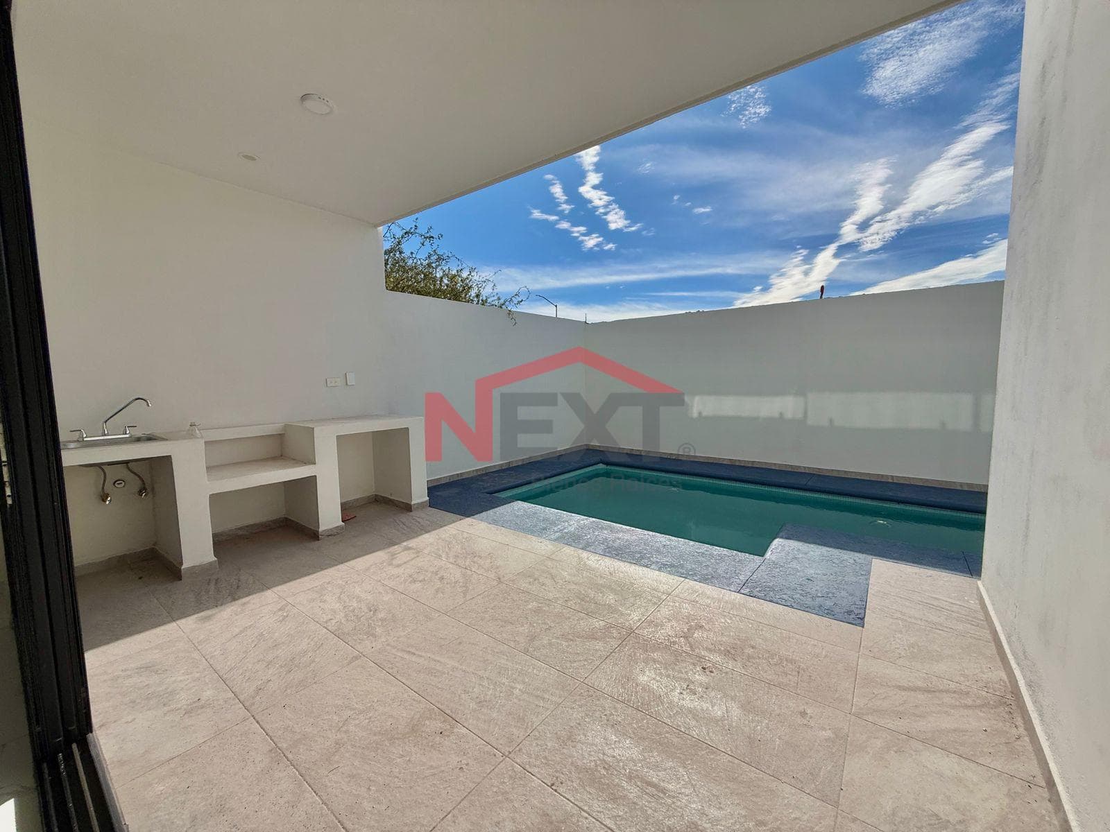 New House Near the Beach with a Pool, Panoramic Terraces, and High-Quality Finishes.