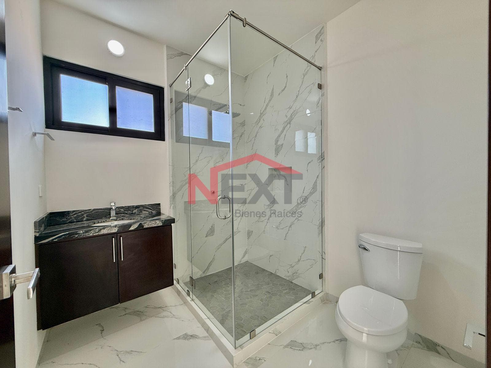 New House Near the Beach with a Pool, Panoramic Terraces, and High-Quality Finishes.