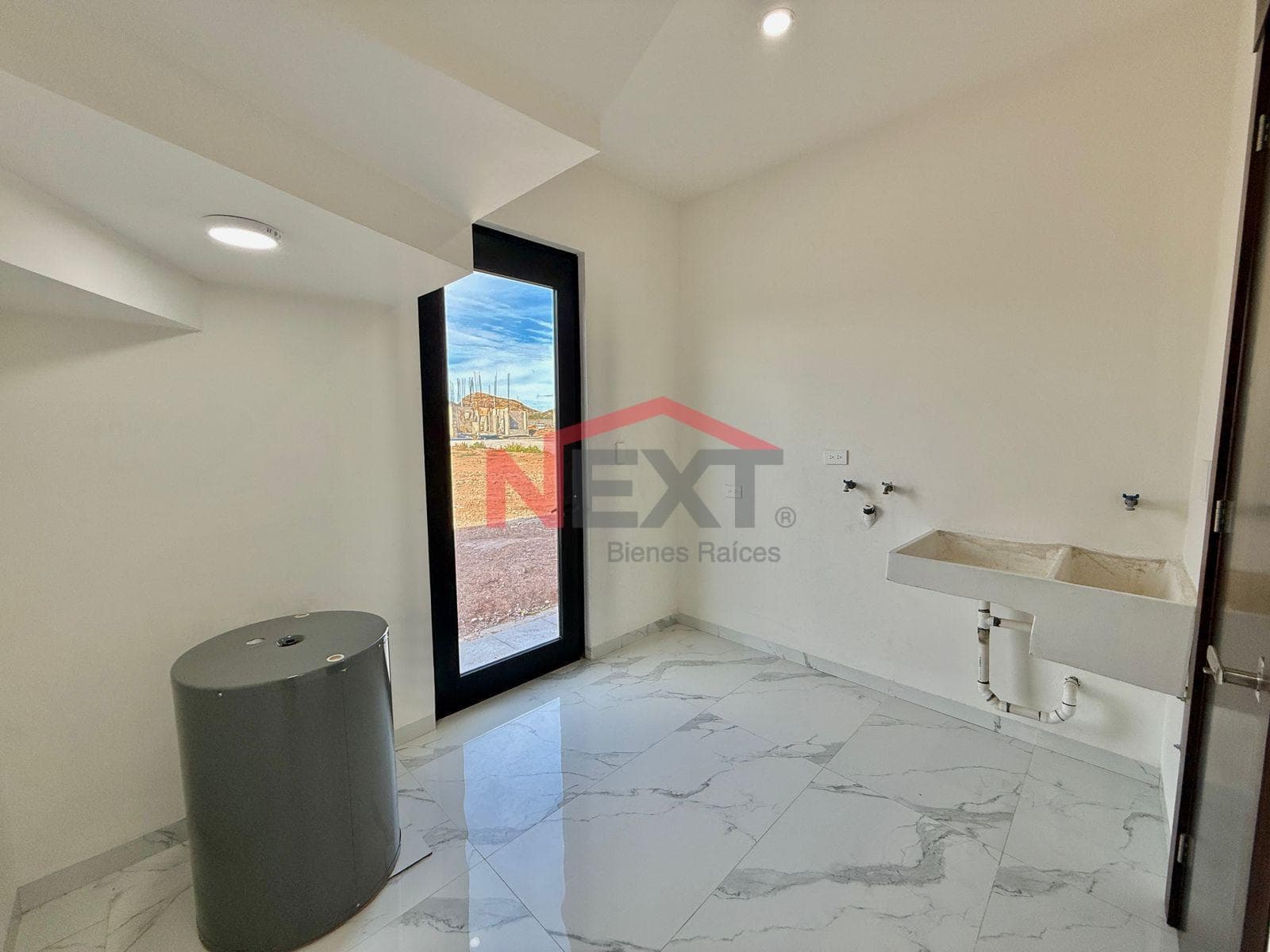 New House Near the Beach with a Pool, Panoramic Terraces, and High-Quality Finishes.