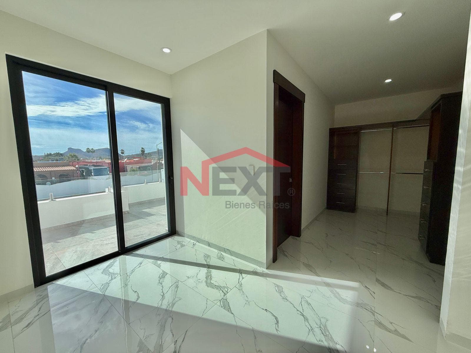 New House Near the Beach with a Pool, Panoramic Terraces, and High-Quality Finishes.