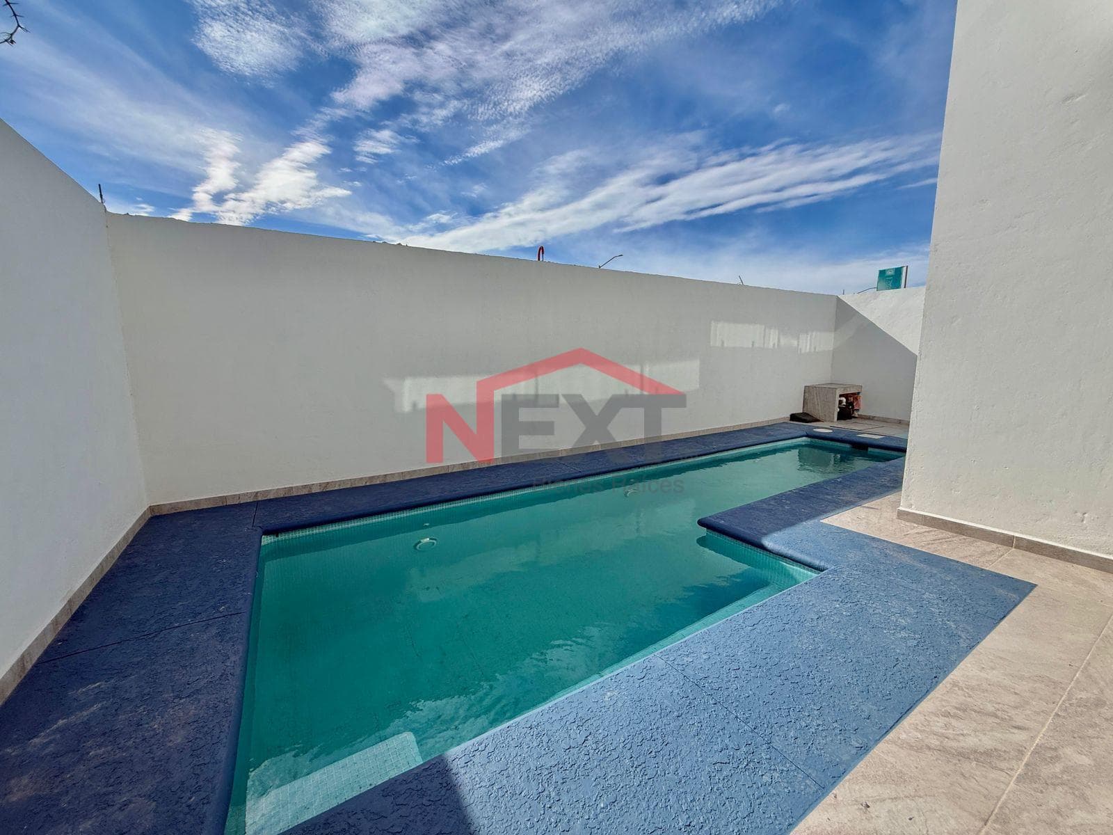 New House Near the Beach with a Pool, Panoramic Terraces, and High-Quality Finishes.