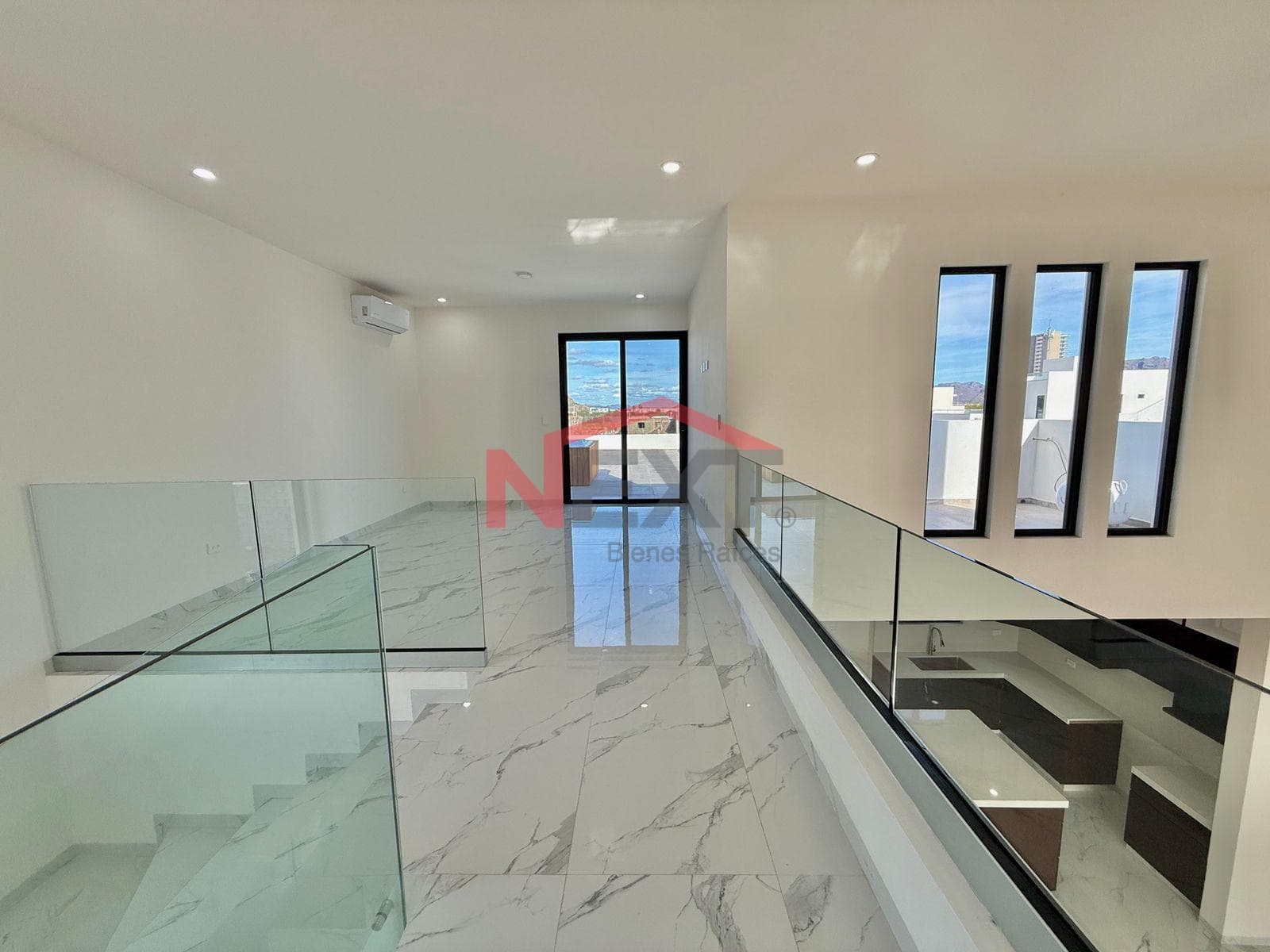 New House Near the Beach with a Pool, Panoramic Terraces, and High-Quality Finishes.