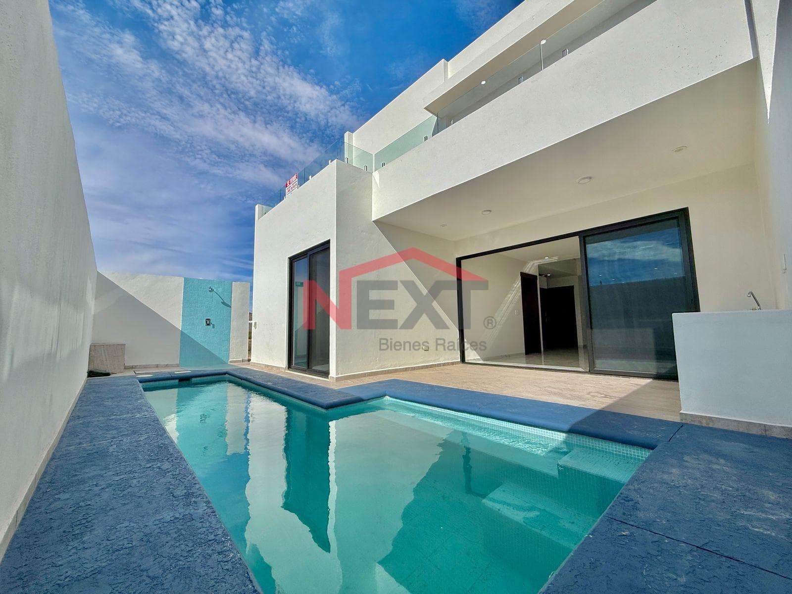 New House Near the Beach with a Pool, Panoramic Terraces, and High-Quality Finishes.