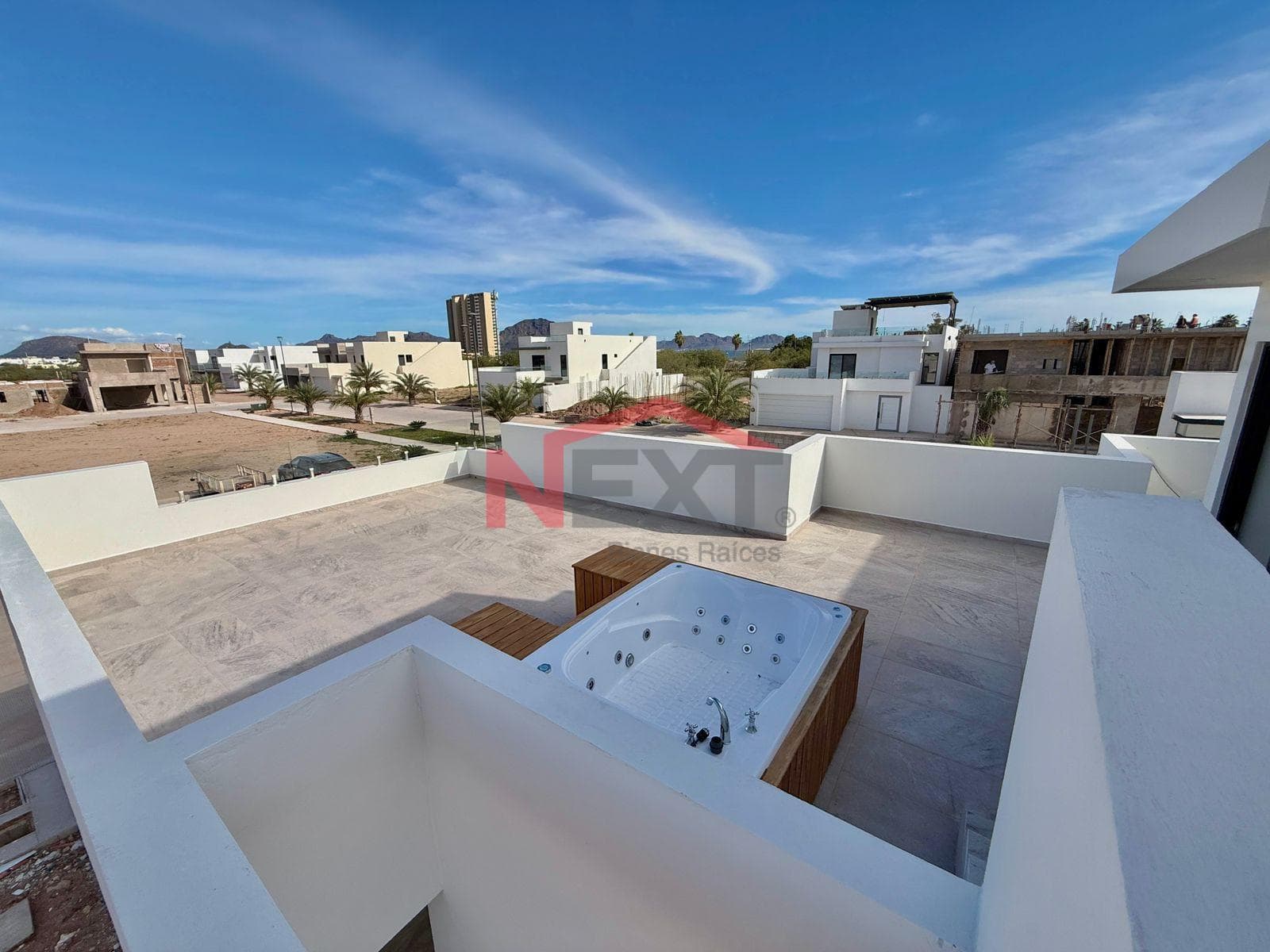 New House Near the Beach with a Pool, Panoramic Terraces, and High-Quality Finishes.