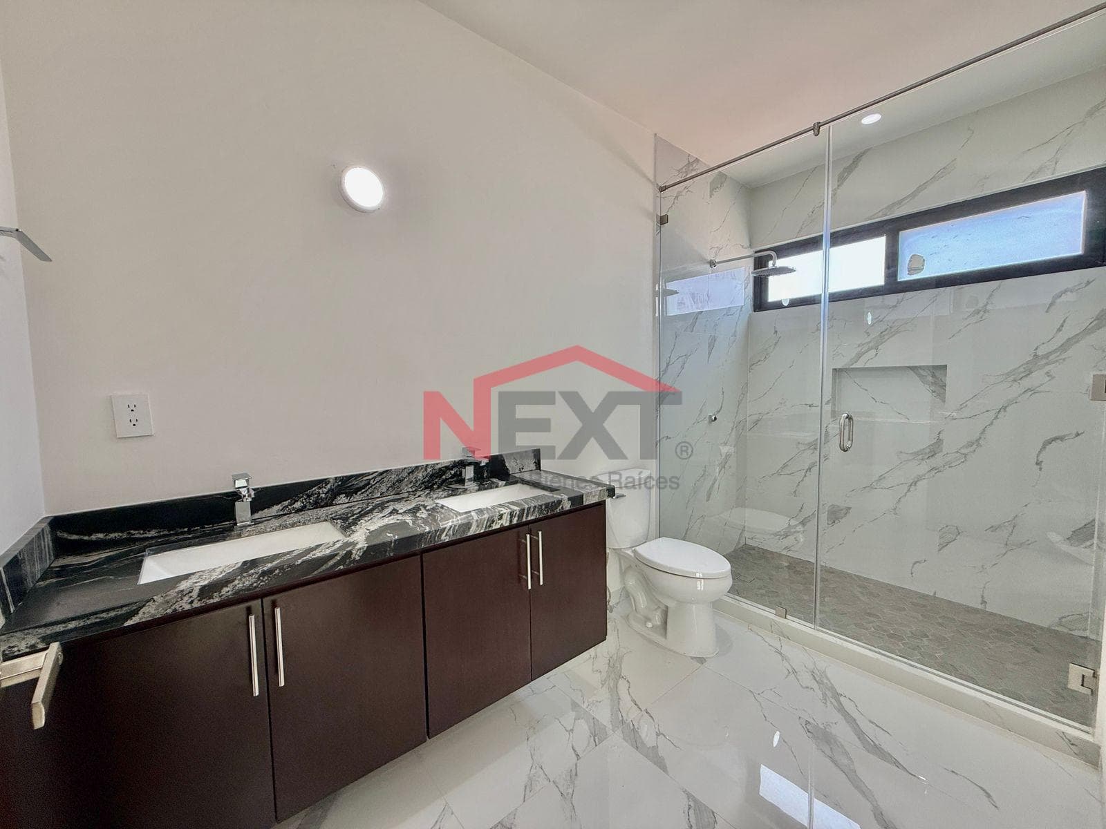 New House Near the Beach with a Pool, Panoramic Terraces, and High-Quality Finishes.