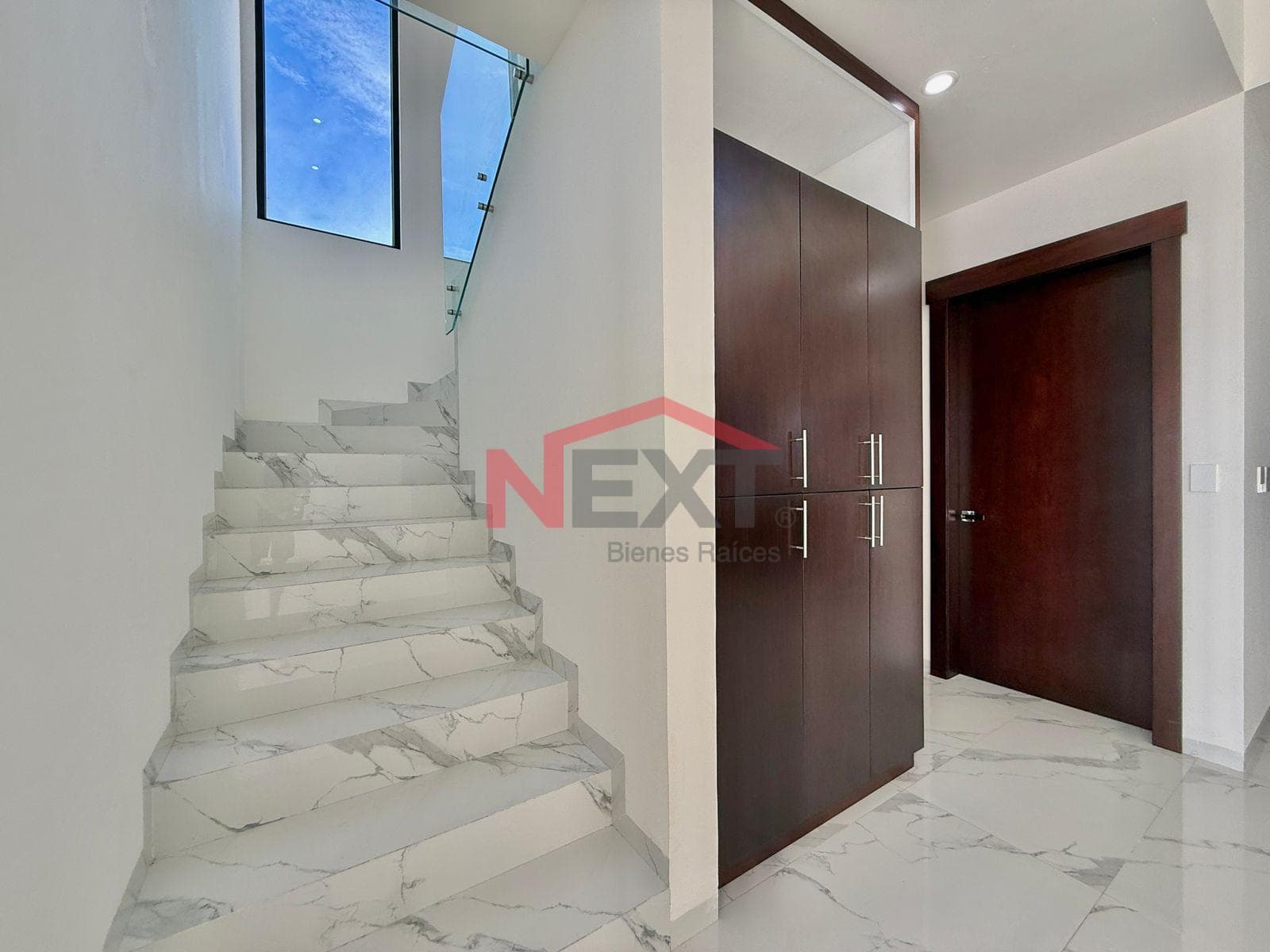 New House Near the Beach with a Pool, Panoramic Terraces, and High-Quality Finishes.