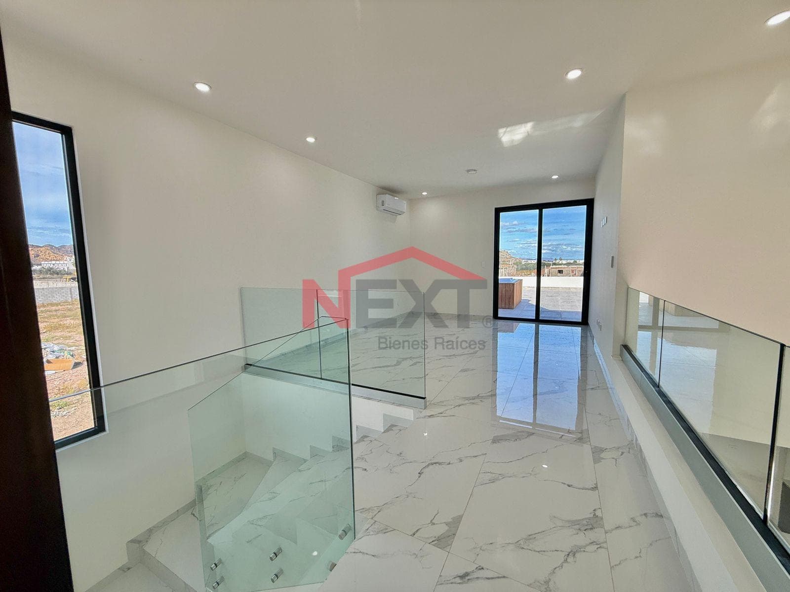New House Near the Beach with a Pool, Panoramic Terraces, and High-Quality Finishes.