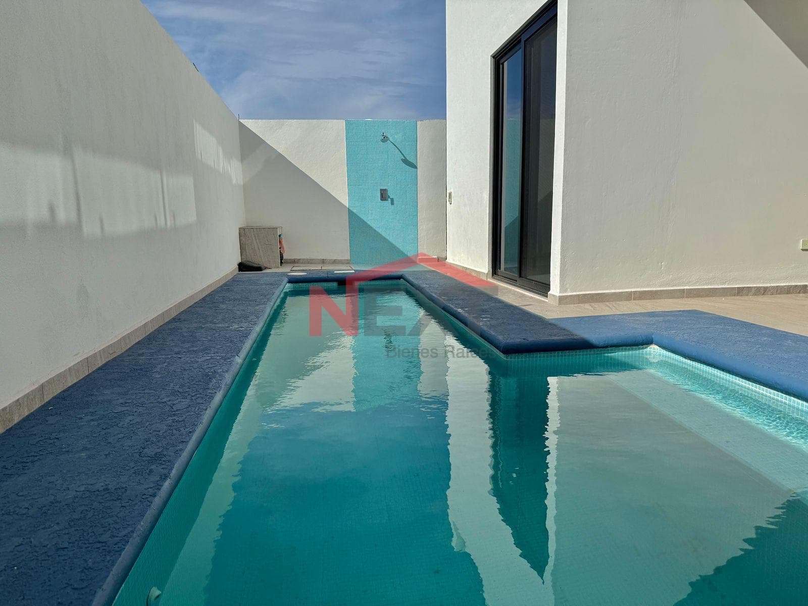 New House Near the Beach with a Pool, Panoramic Terraces, and High-Quality Finishes.