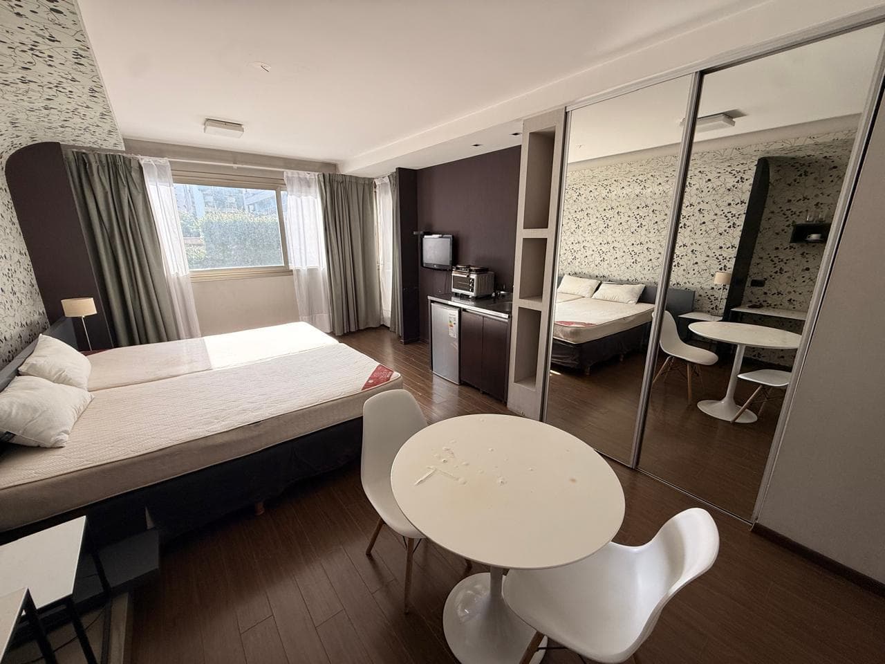 Furnished studio apartment in an "Appart Hotel" style with a gym