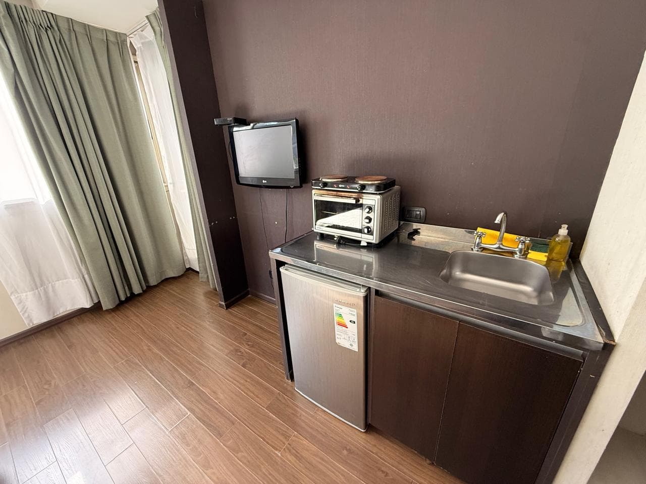 Furnished studio apartment in an "Appart Hotel" style with a gym