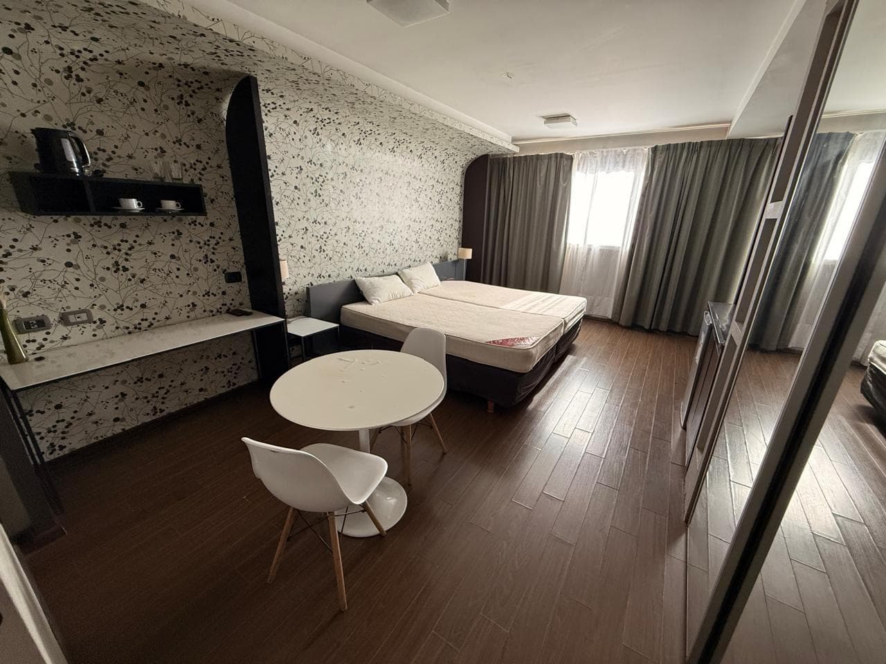 Furnished studio apartment in an "Appart Hotel" style with a gym