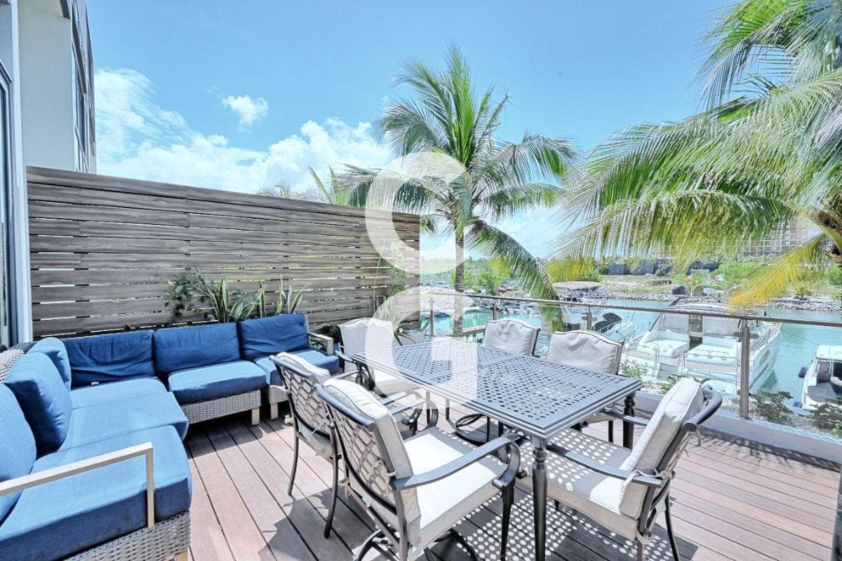 House for Sale in Cancun at Canal Homes Puerto Cancun with a Terrace Overlooking the Canal