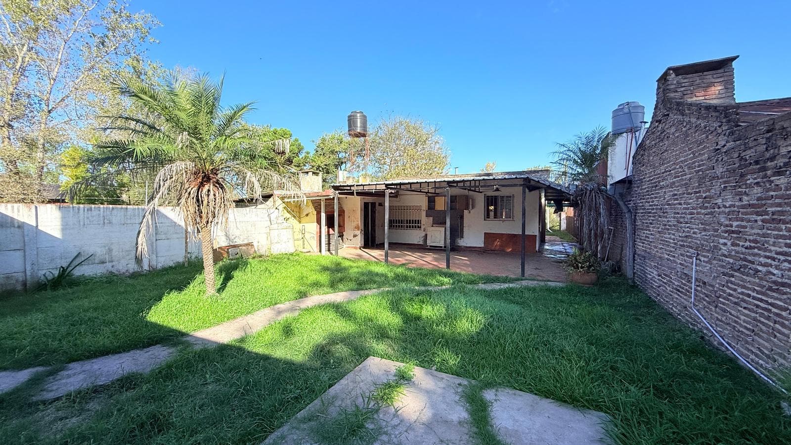 For Sale: Two-Bedroom House with Triple Garage, Barbecue Area, and Garden. Villa Amelia