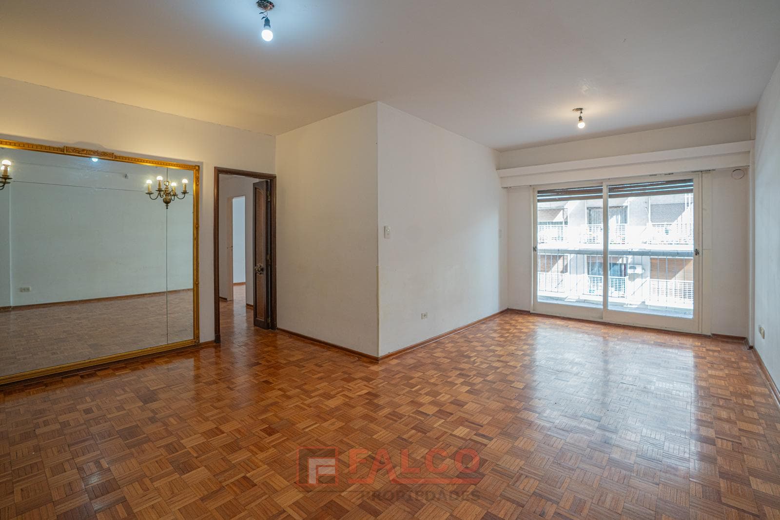 Four rooms with an adjoining room and a balcony facing the street—Attached, covered garage