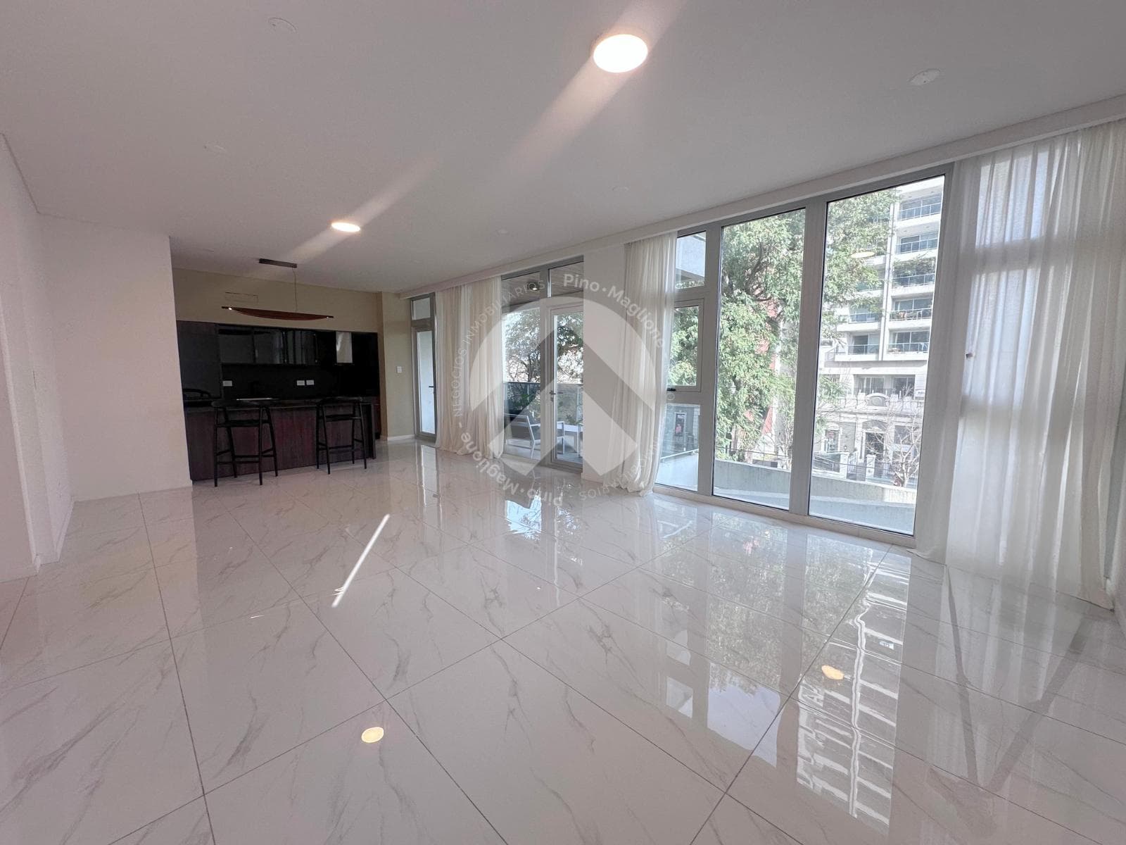 APARTMENT WITH GARAGE IN TORRE ELEVEN – 1426 Gálvez Blvd.