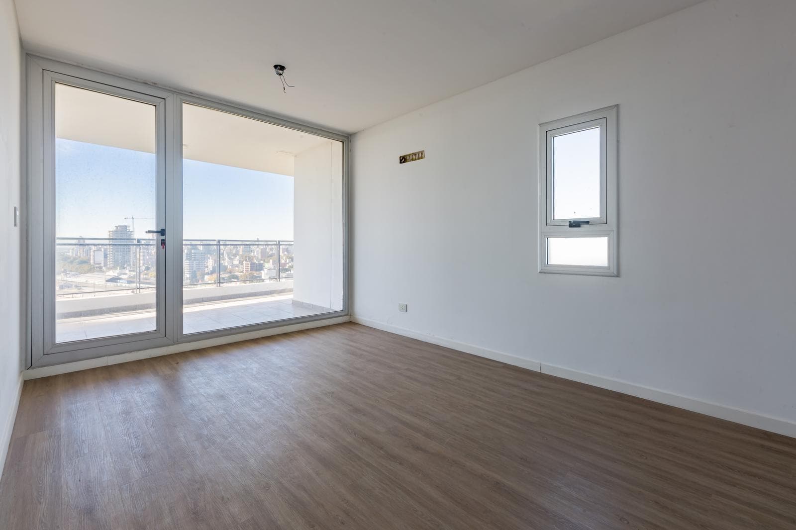 FOR SALE | TRADE - 1-bedroom apartment with balcony and garage – Puerto Norte, Rosario.
