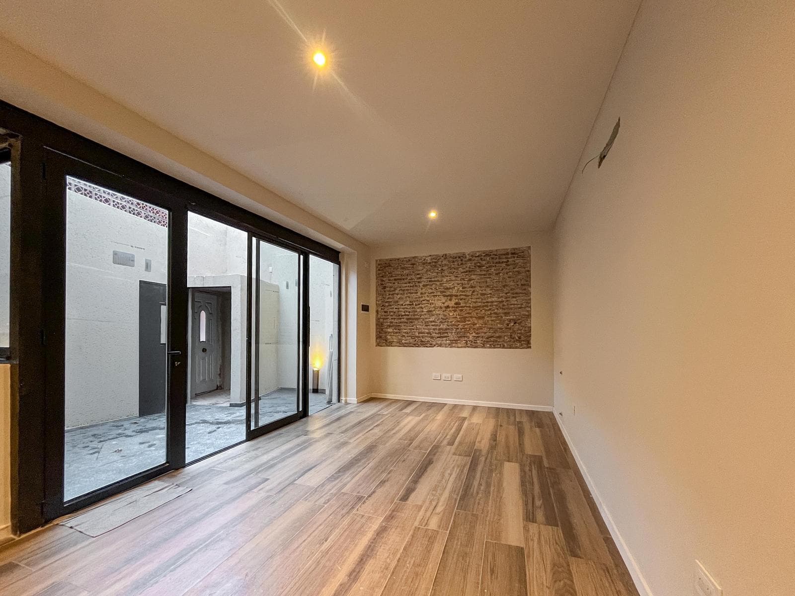 One-bedroom row house with a patio, terrace, and brand-new barbecue area