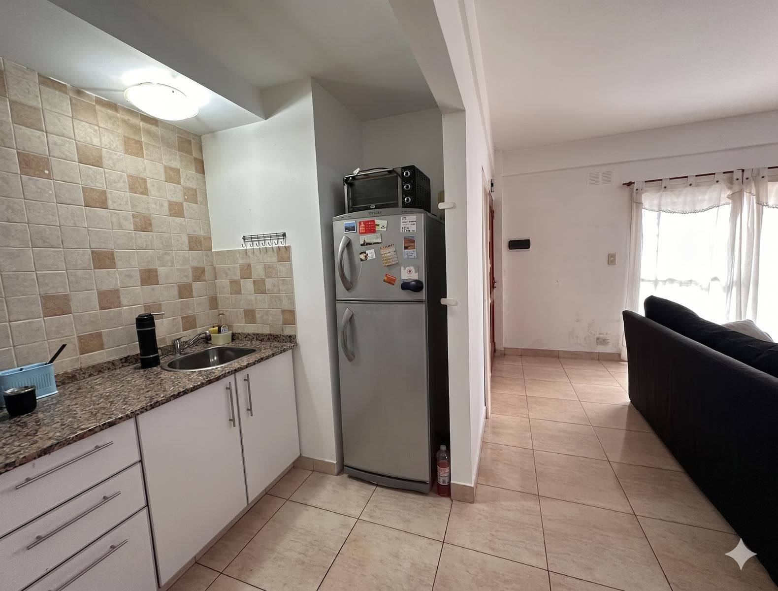 2-room apartment facing the street with a garage