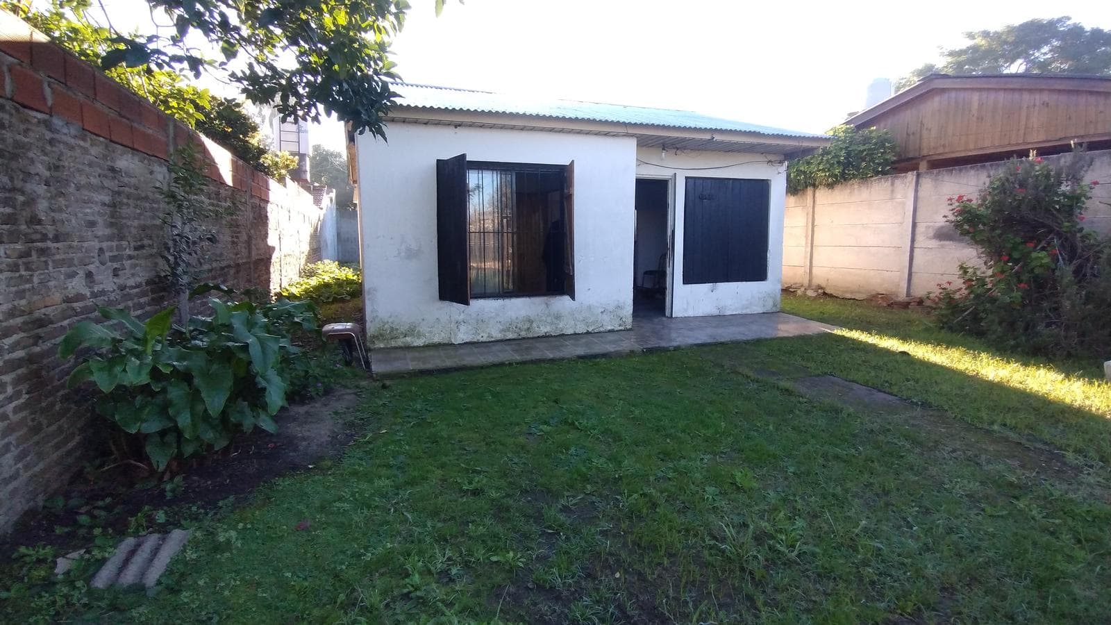 FOR SALE: LOT WITH HOUSE IN NEED OF RENOVATION IN HUDSON