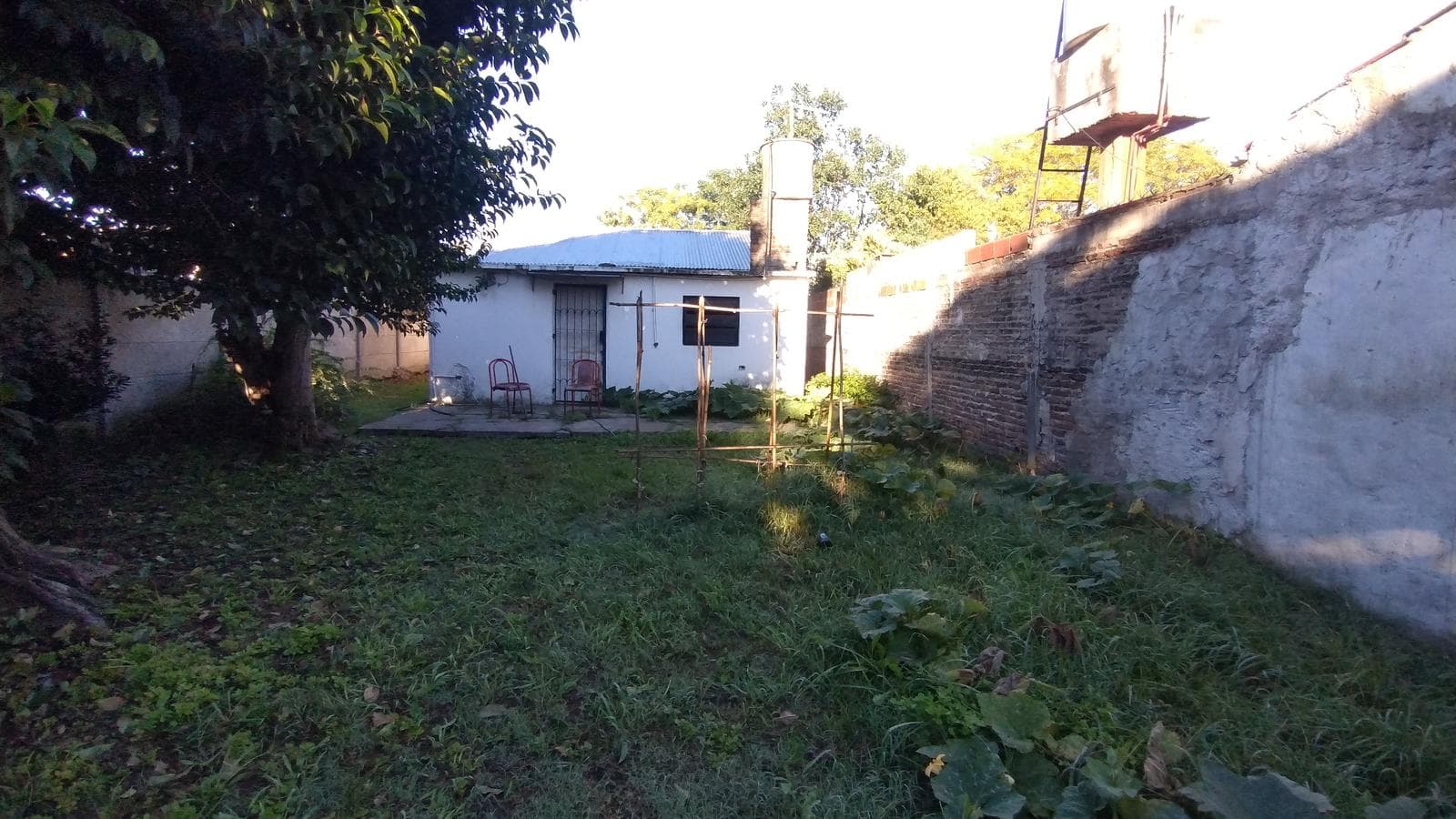 FOR SALE: LOT WITH HOUSE IN NEED OF RENOVATION IN HUDSON