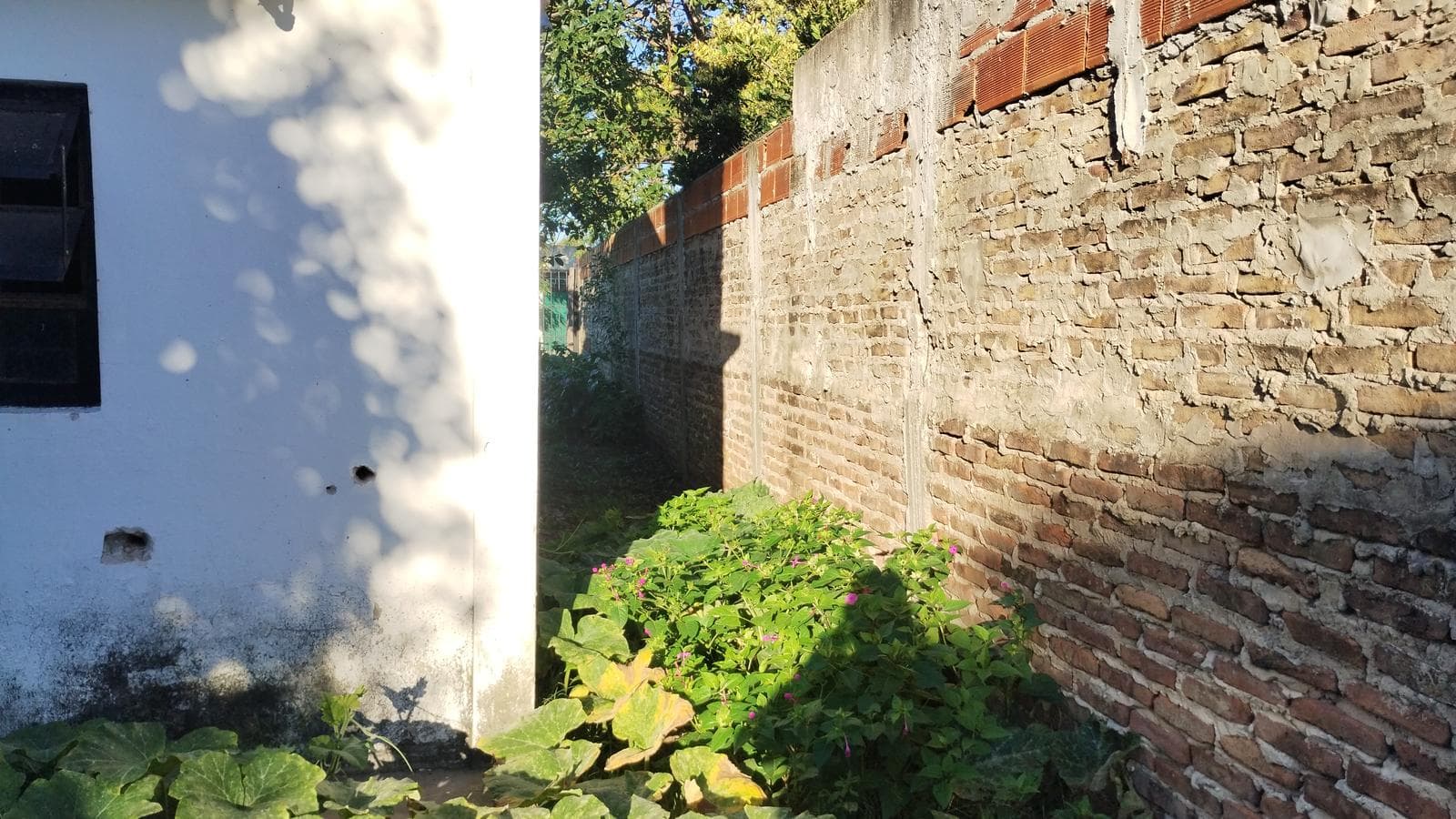 FOR SALE: LOT WITH HOUSE IN NEED OF RENOVATION IN HUDSON