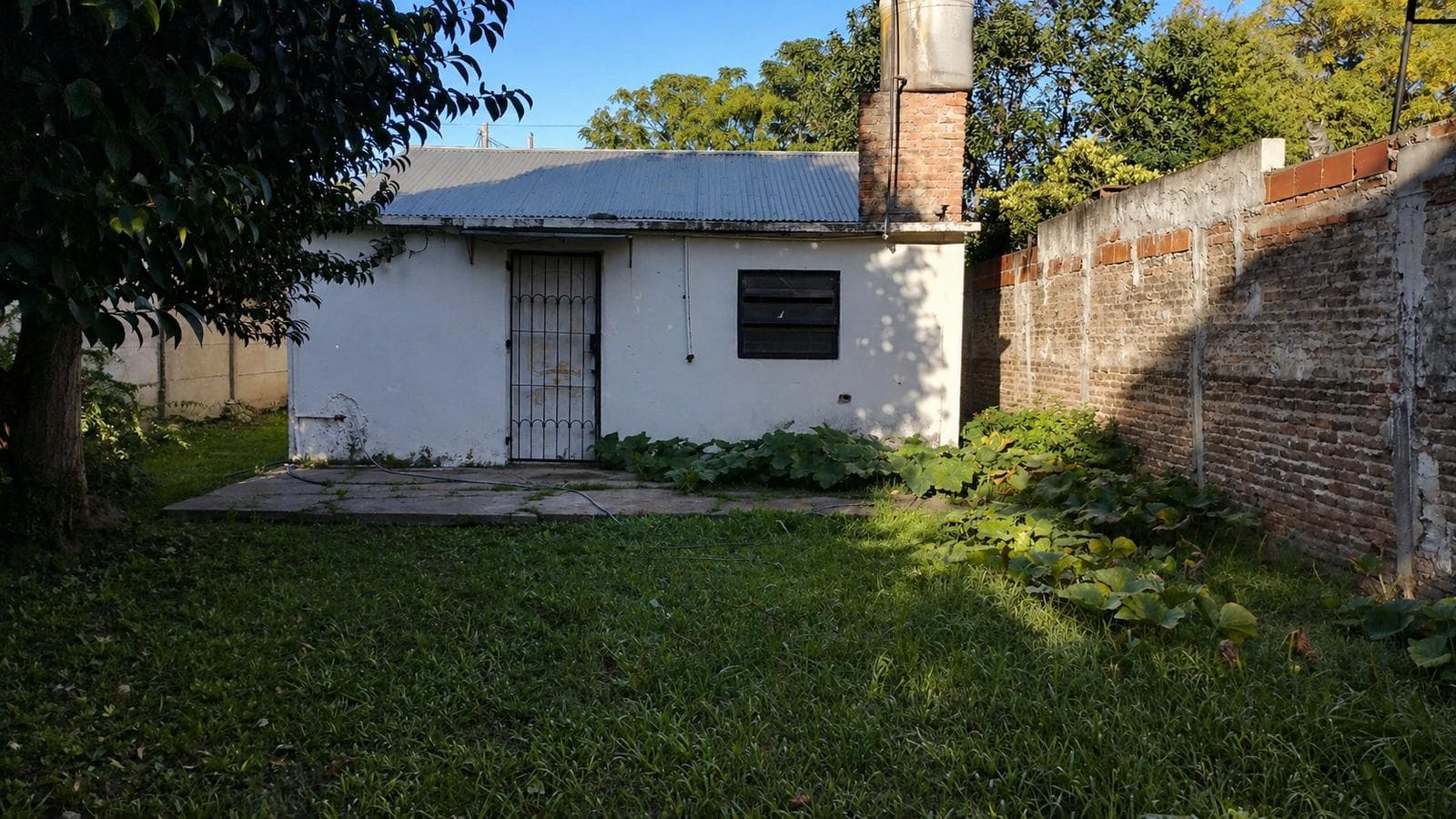 FOR SALE: LOT WITH HOUSE IN NEED OF RENOVATION IN HUDSON