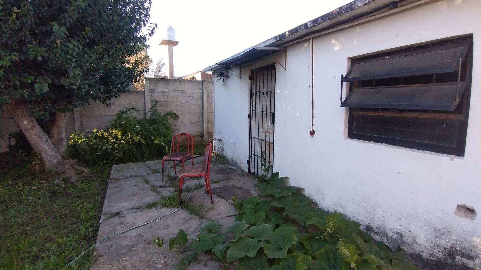 FOR SALE: LOT WITH HOUSE IN NEED OF RENOVATION IN HUDSON