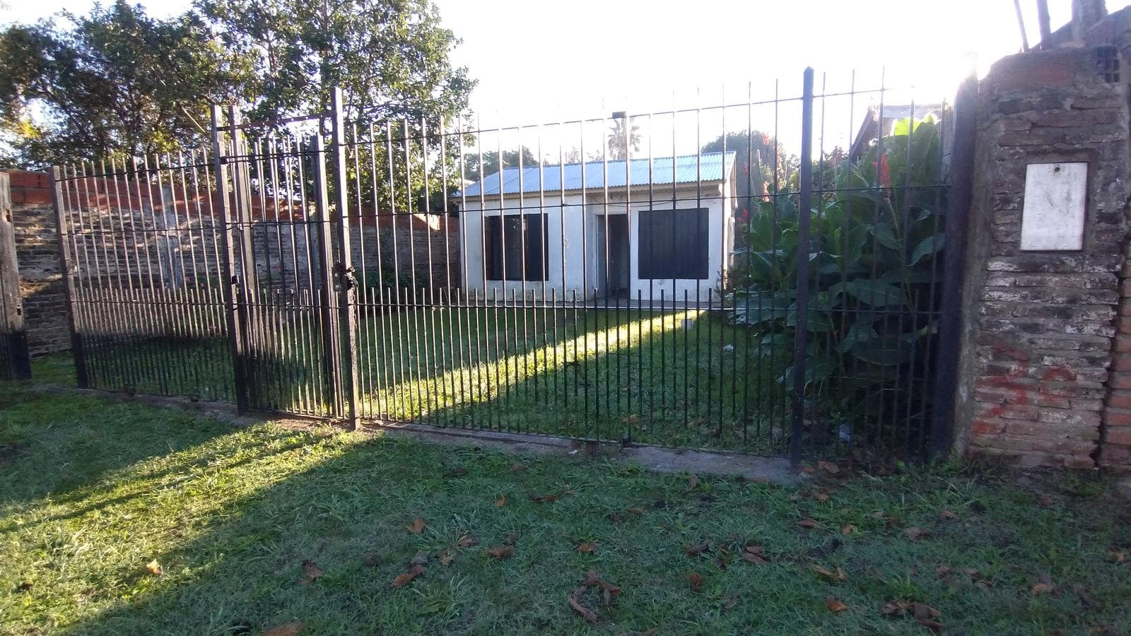 FOR SALE: LOT WITH HOUSE IN NEED OF RENOVATION IN HUDSON
