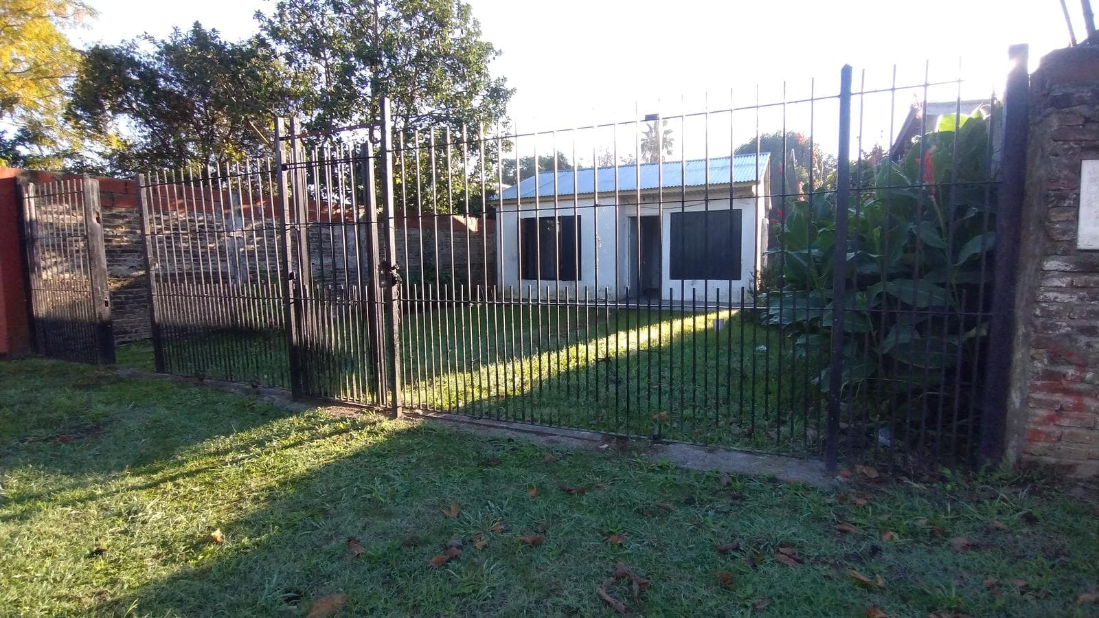 FOR SALE: LOT WITH HOUSE IN NEED OF RENOVATION IN HUDSON