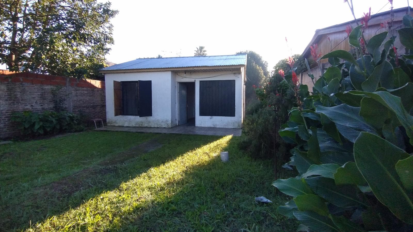 FOR SALE: LOT WITH HOUSE IN NEED OF RENOVATION IN HUDSON