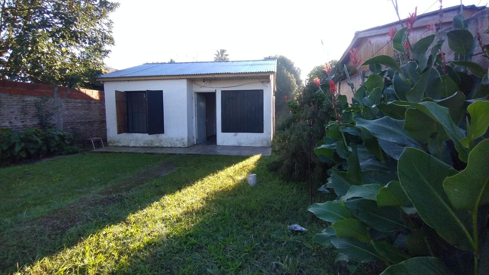 FOR SALE: LOT WITH HOUSE IN NEED OF RENOVATION IN HUDSON