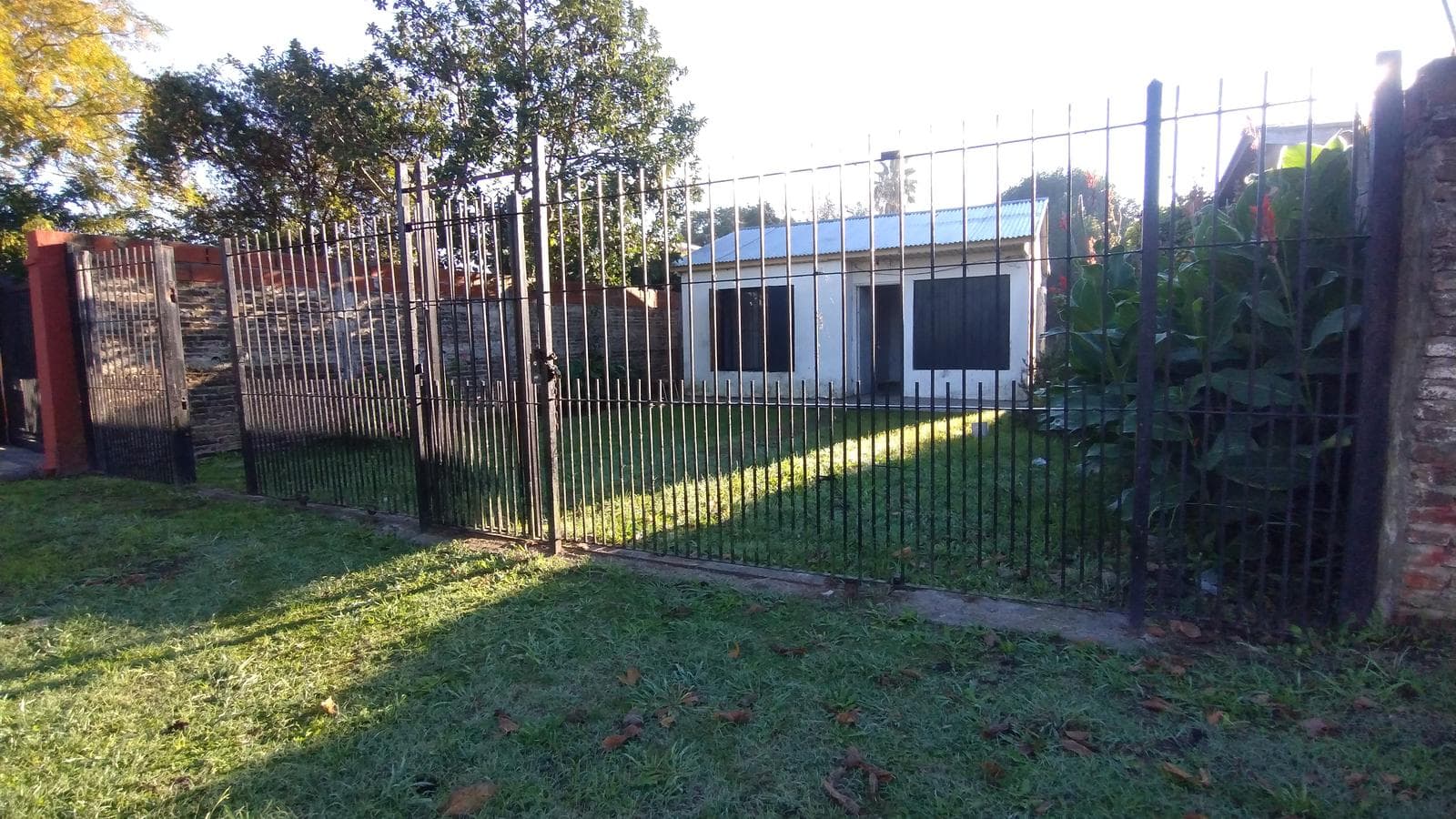 FOR SALE: LOT WITH HOUSE IN NEED OF RENOVATION IN HUDSON