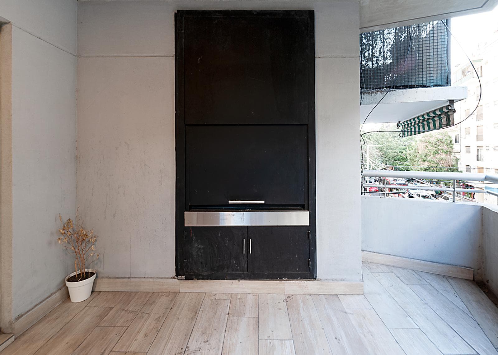 4-room apartment for sale in Belgrano, with a garage and a terrace balcony with a grill.