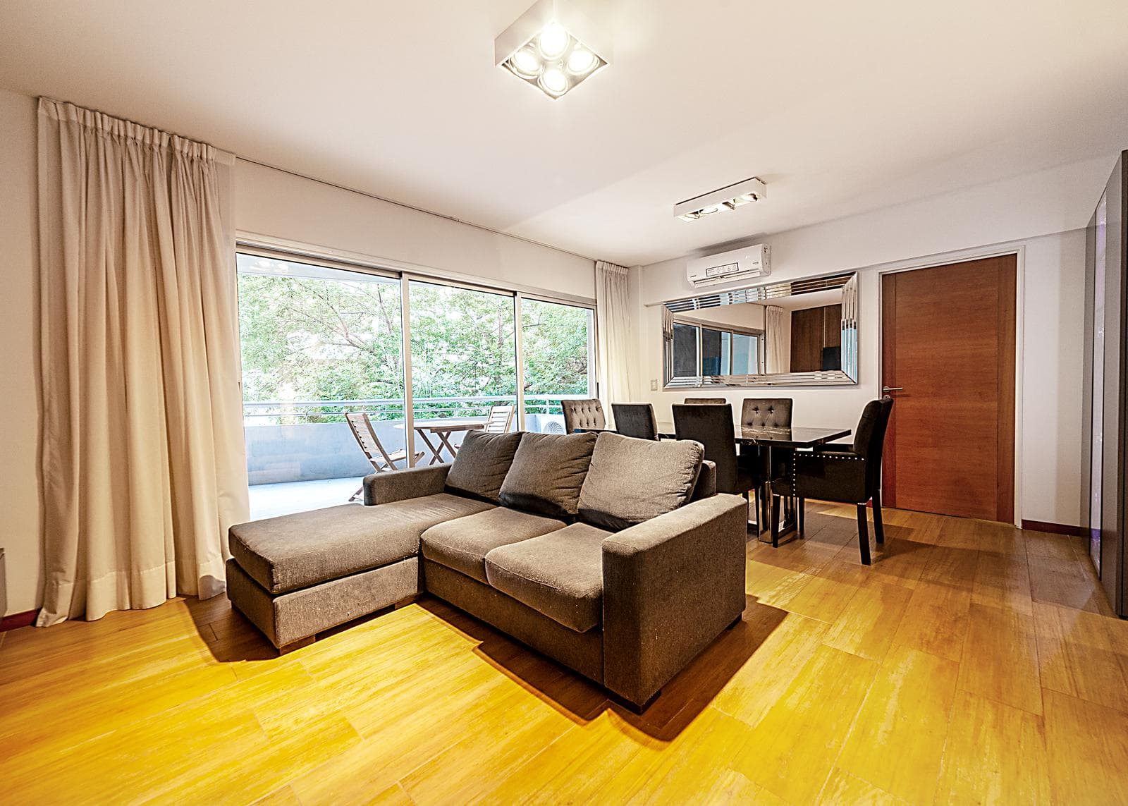 4-room apartment for sale in Belgrano, with a garage and a terrace balcony with a grill.