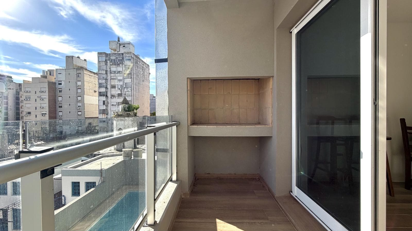 1-bedroom apartment with a grill on the balcony