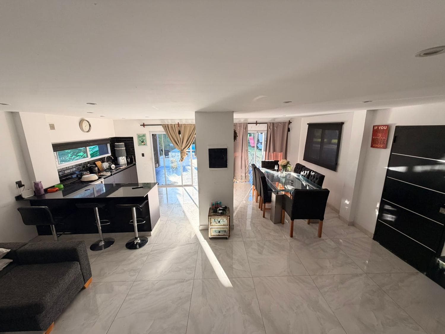 Modern three-bedroom house with a pool