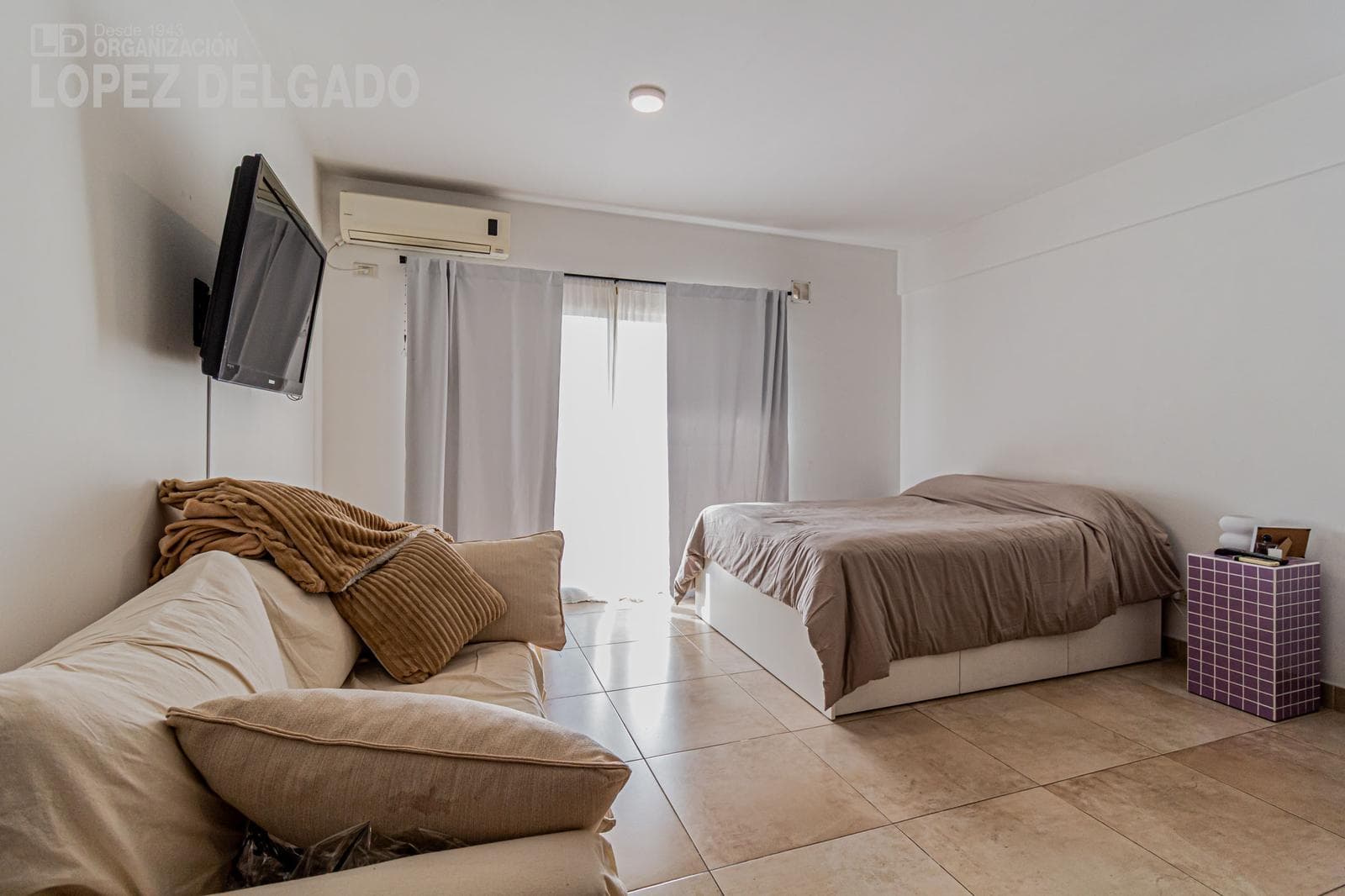 One-bedroom apartment with a balcony facing the rear of the building in Villa Gral. Mitre