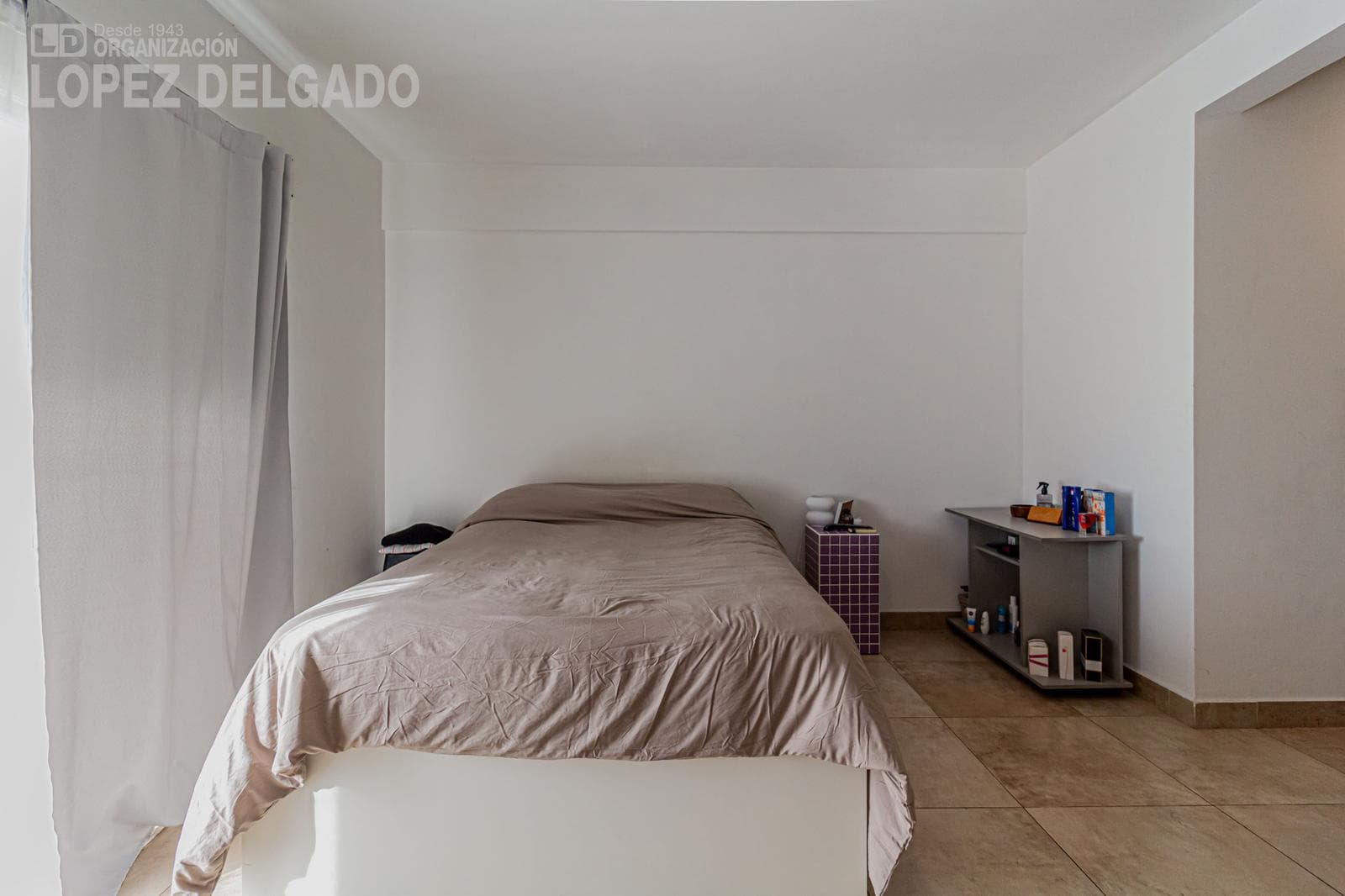 One-bedroom apartment with a balcony facing the rear of the building in Villa Gral. Mitre