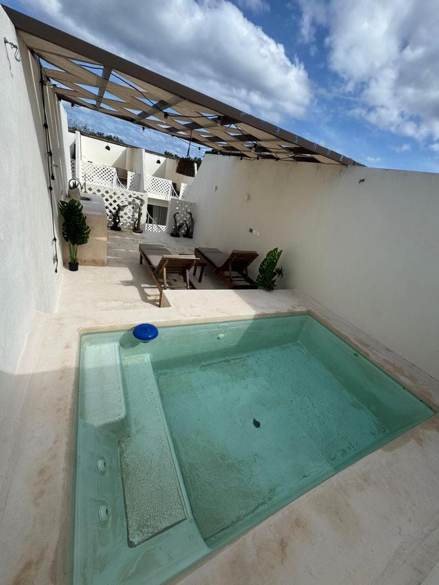 Furnished 1-bedroom apartment with a pool
