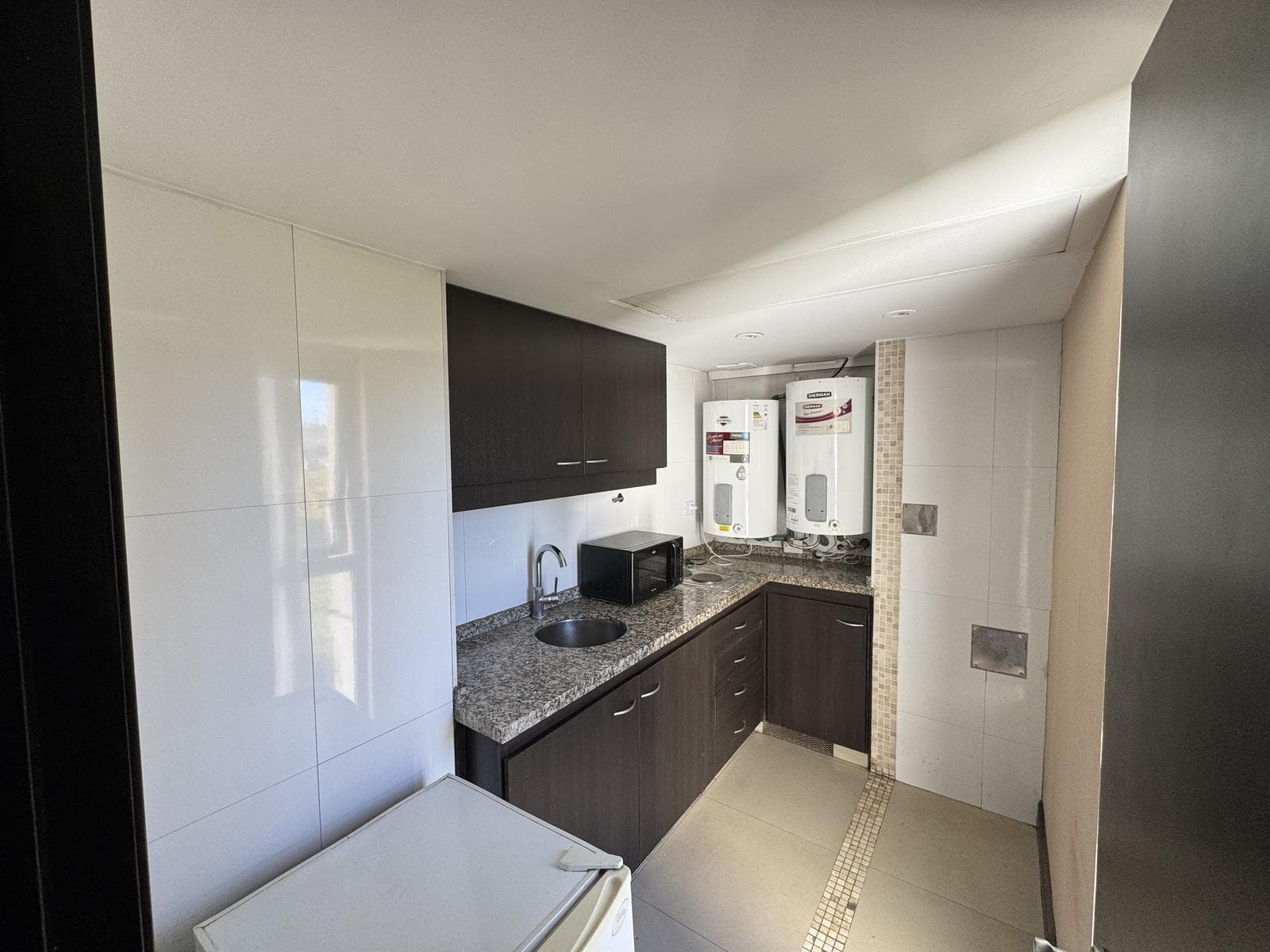 Furnished apartment for rent in Mendoza with a garage.