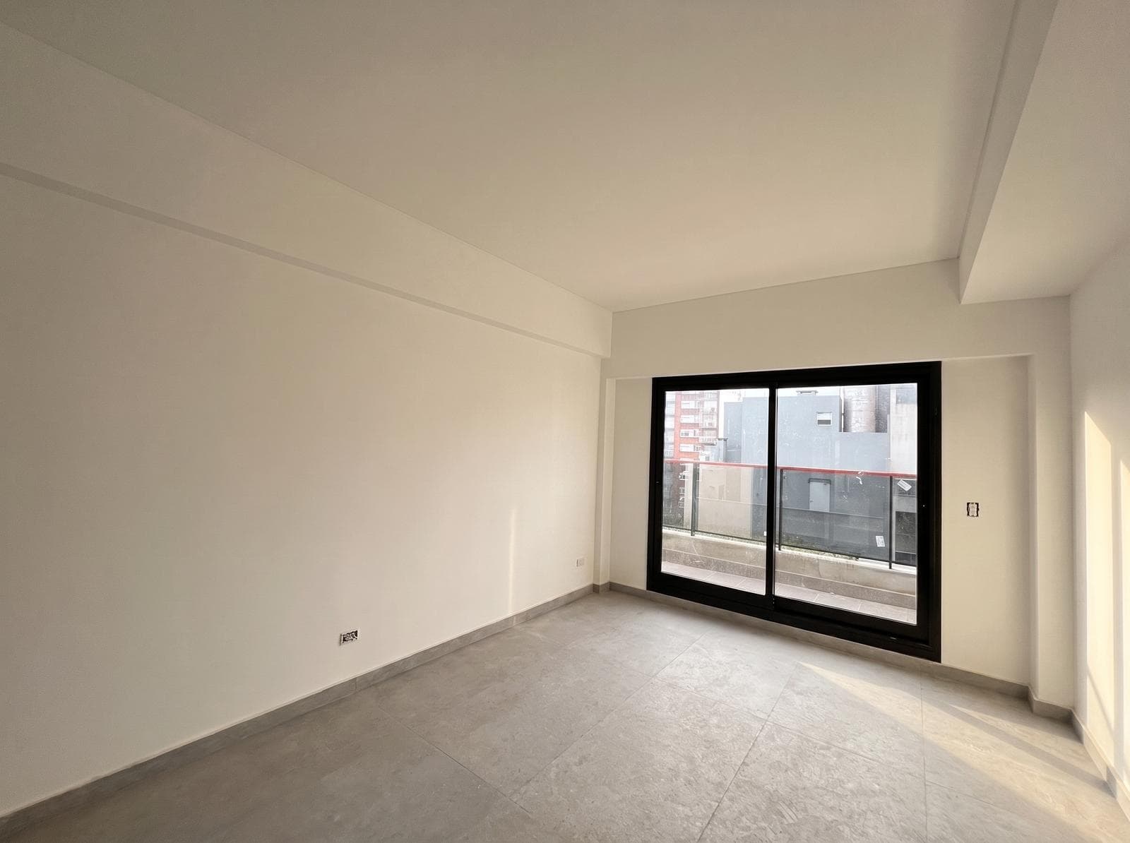 Two-room apartment with an en suite bedroom, a full-length balcony, and a half-bath