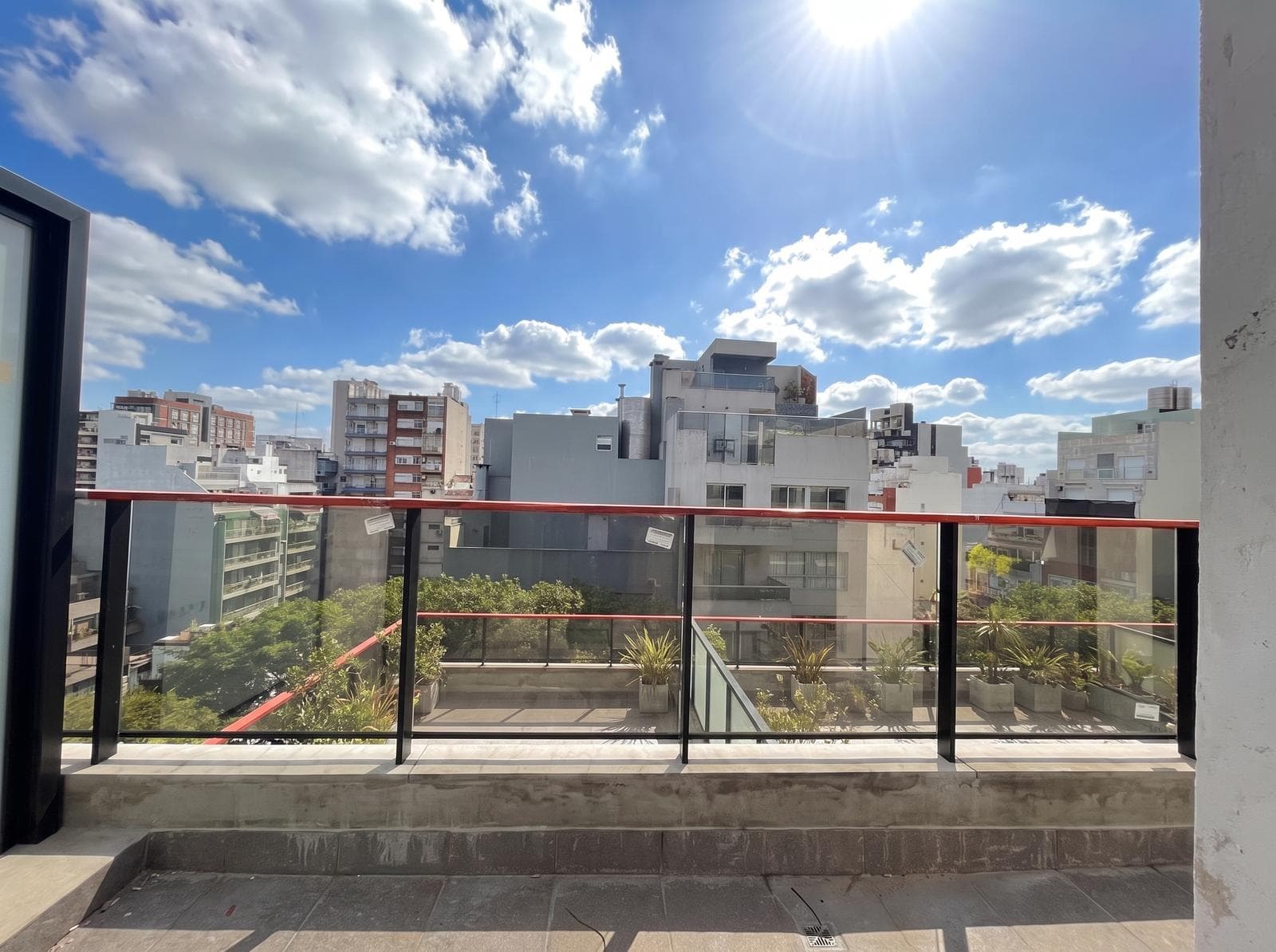 Two-room apartment with an en suite bedroom, a full-length balcony, and a half-bath