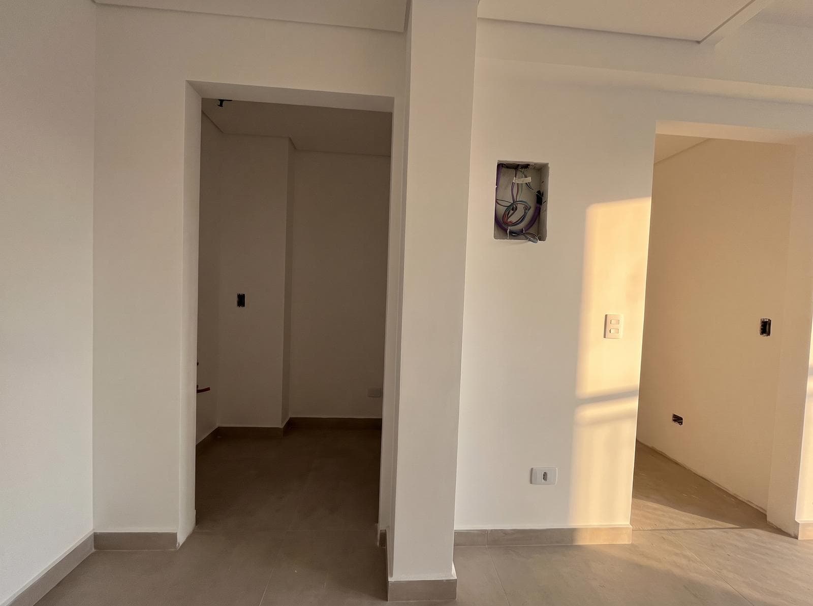 Two-room apartment with an en suite bedroom, a full-length balcony, and a half-bath