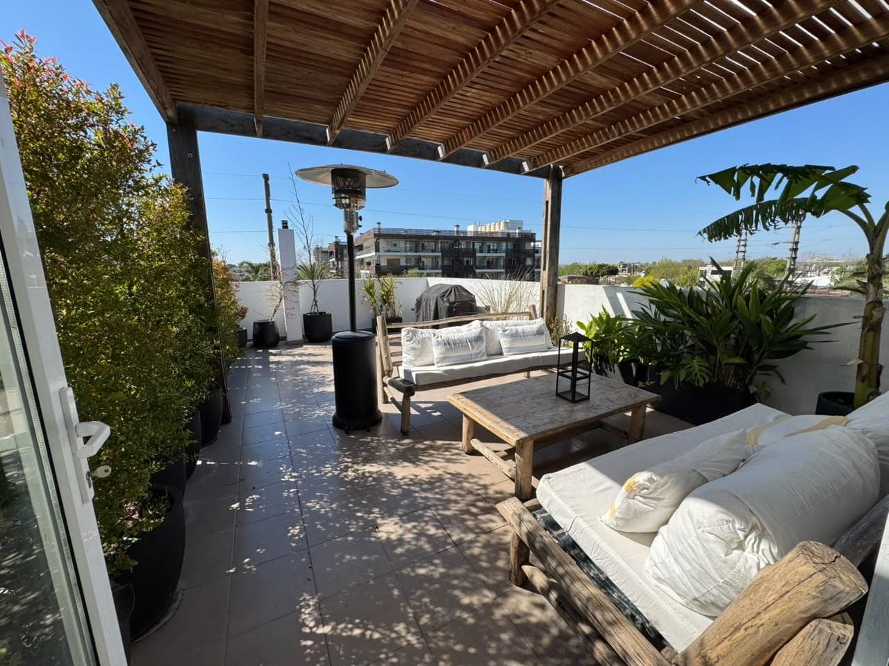 For Sale: Exclusive Triplex with Large Private Terrace, Two Bathrooms, a Half-Bath, and a Garage