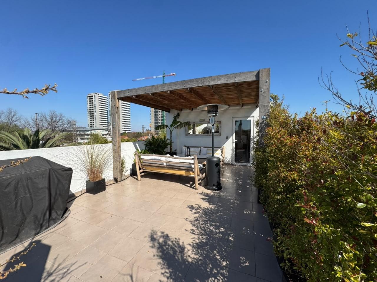 For Sale: Exclusive Triplex with Large Private Terrace, Two Bathrooms, a Half-Bath, and a Garage