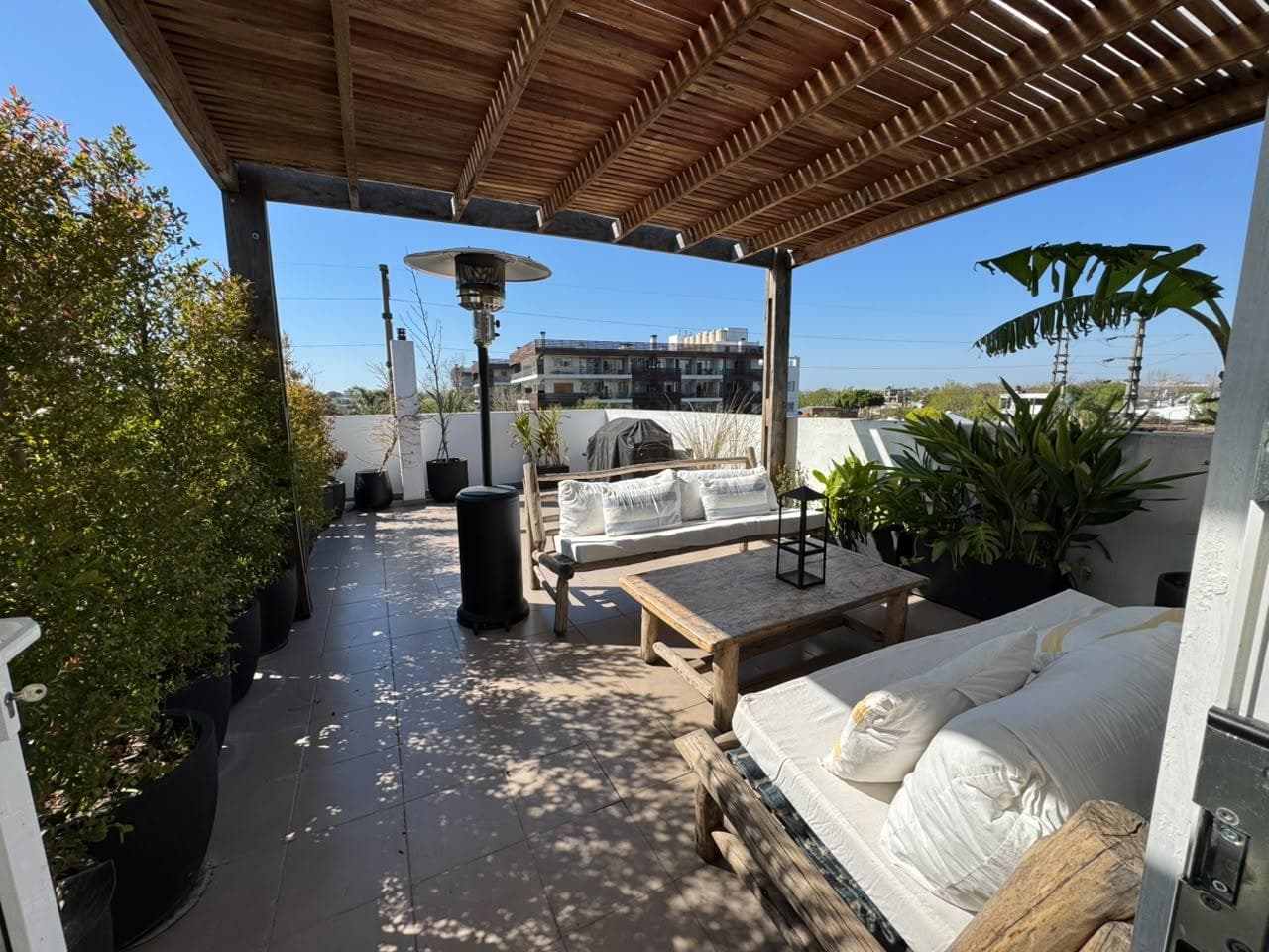 For Sale: Exclusive Triplex with Large Private Terrace, Two Bathrooms, a Half-Bath, and a Garage